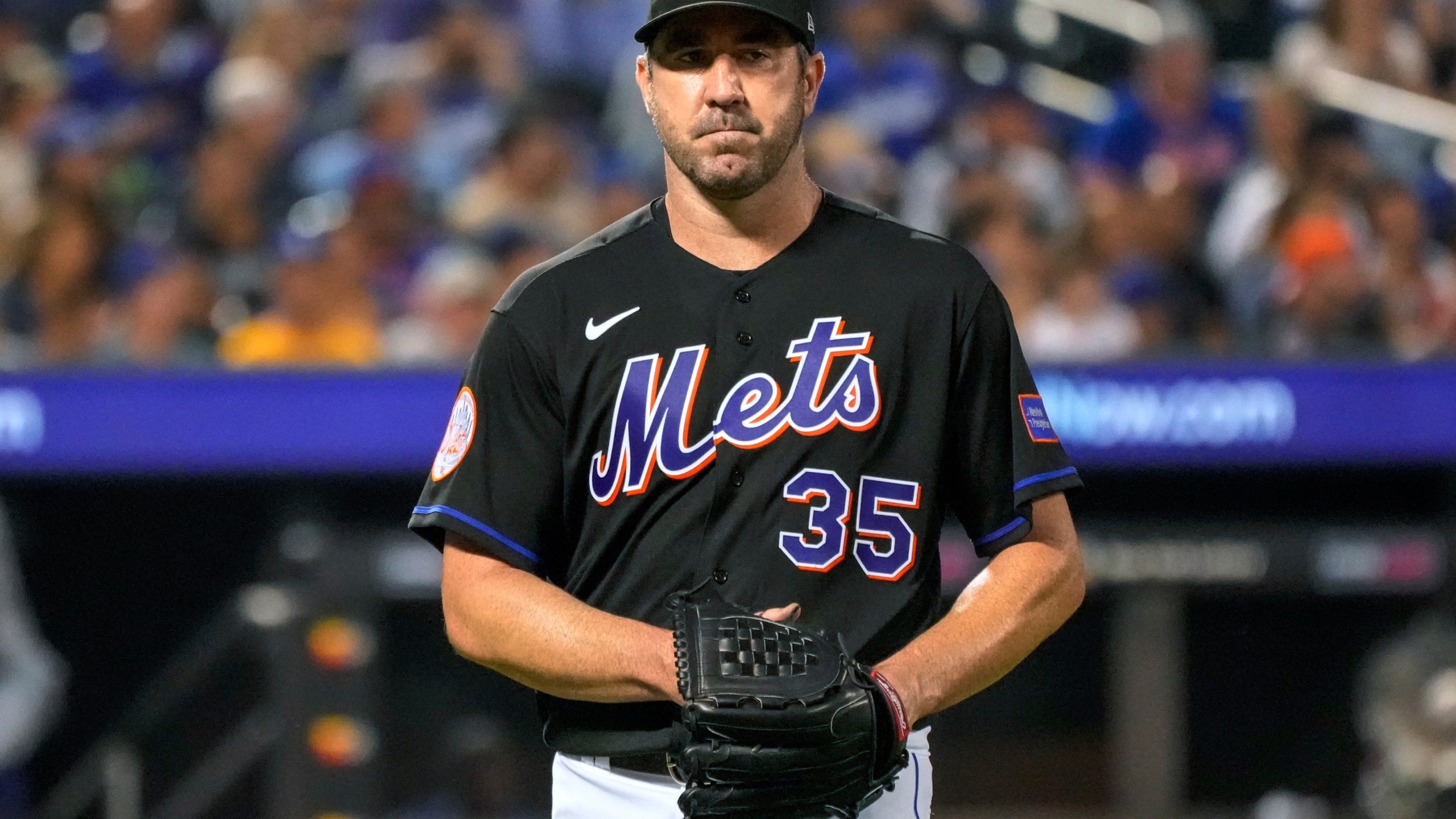 New York Mets pitcher Justin Verlander walks off the field after giving up three runs to the Los Angeles Dodgers during the fifth inning of a baseball game Friday, July 14, 2023, in New York. (AP Photo/Mary Altaffer)
