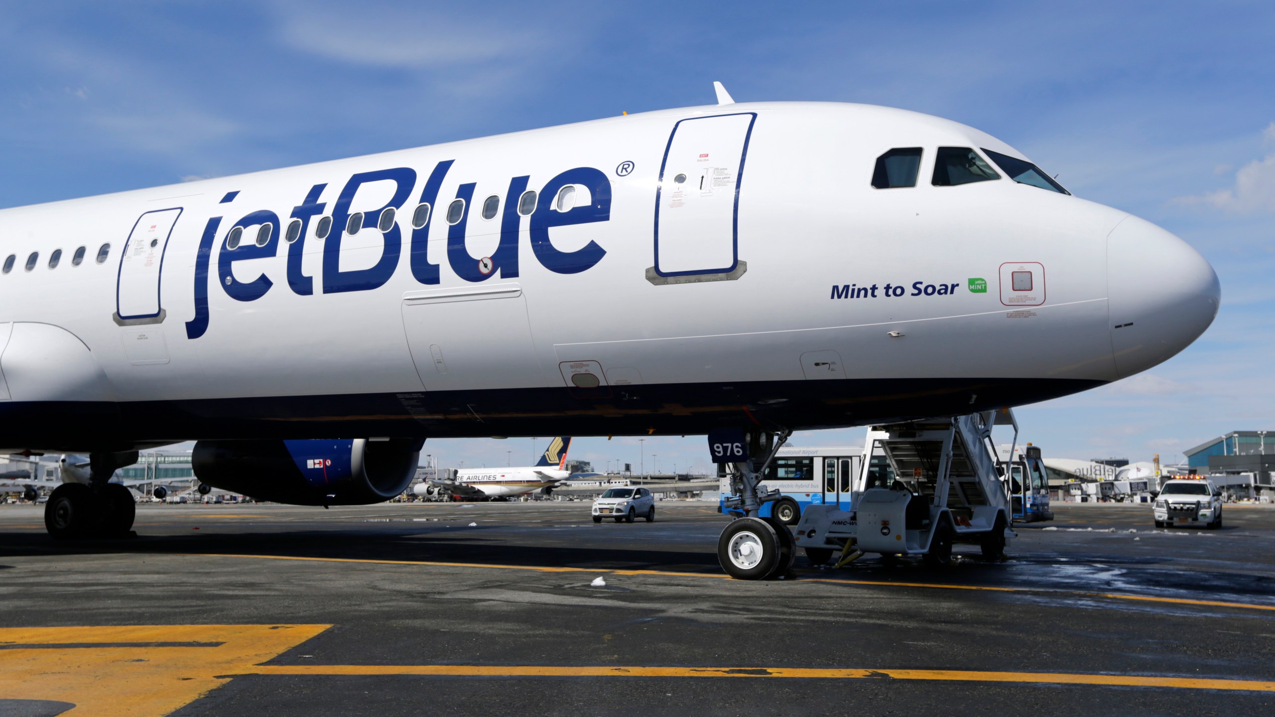 FILE - A JetBlue airplane is shown at John F. Kennedy International Airport in New York, March 16, 2017. JetBlue said Monday, Jan. 8, 2024, that CEO Robin Hayes will step down next month and be replaced by the airline’s president, Joanna Geraghty, who will be the first woman to lead a major U.S. carrier. (AP Photo/Seth Wenig, File)