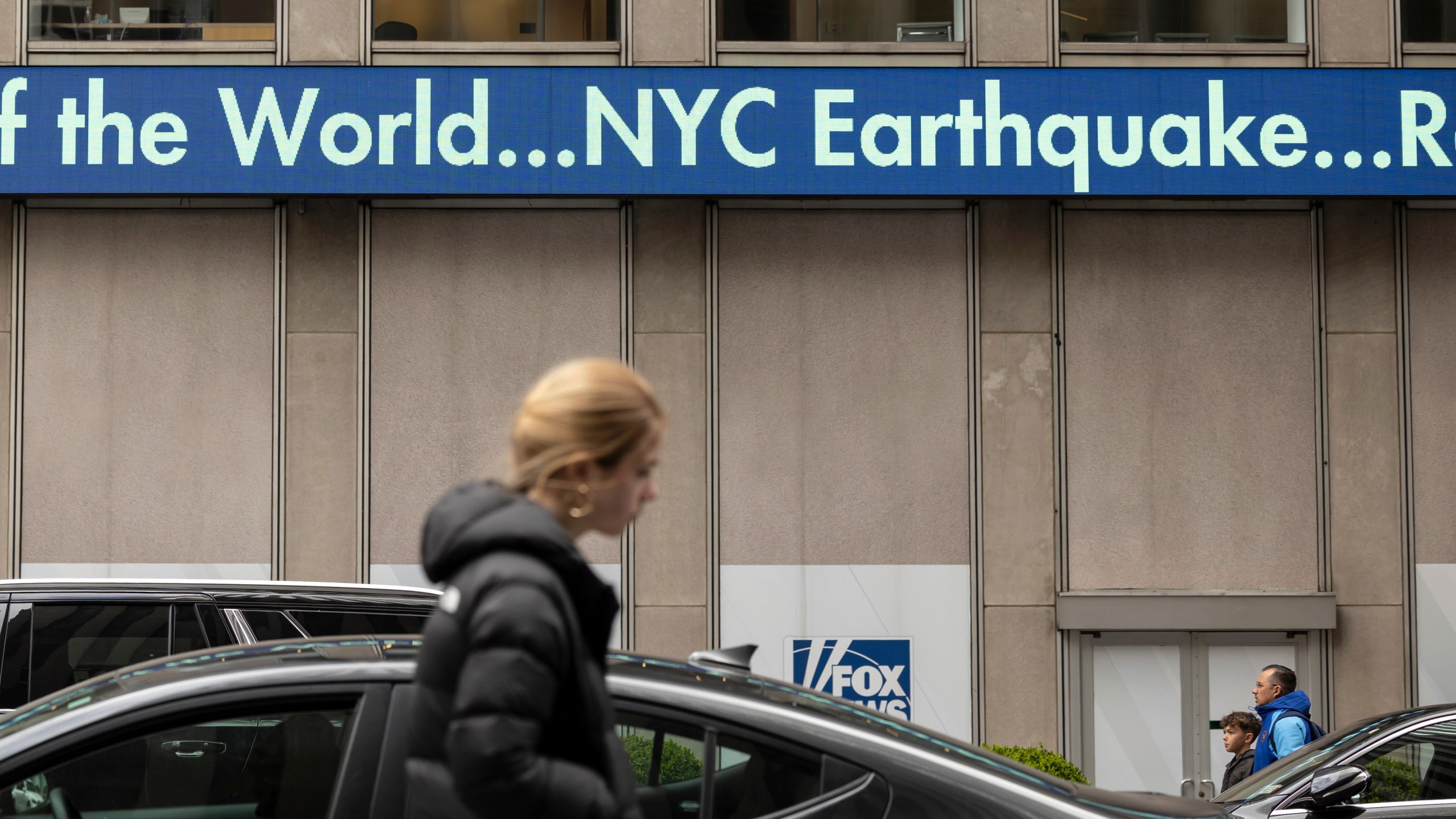 A display shows the news about an earthquake in New York City at News Corp Headquarters, Friday, April 5, 2024, in New York. An earthquake centered between New York and Philadelphia shook skyscrapers and suburbs across the northeastern U.S. Friday, causing no major damage but startling millions of people in an area unaccustomed to such tremors. (AP Photo/Yuki Iwamura)