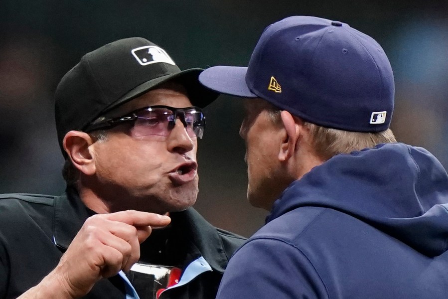Milwaukee Brewers' manager Pat Murphy, right, argues with umpire Chris Guccione during the sixth inning of a baseball game against the Tampa Bay Rays Tuesday, April 30, 2024, in Milwaukee. (AP Photo/Aaron Gash)