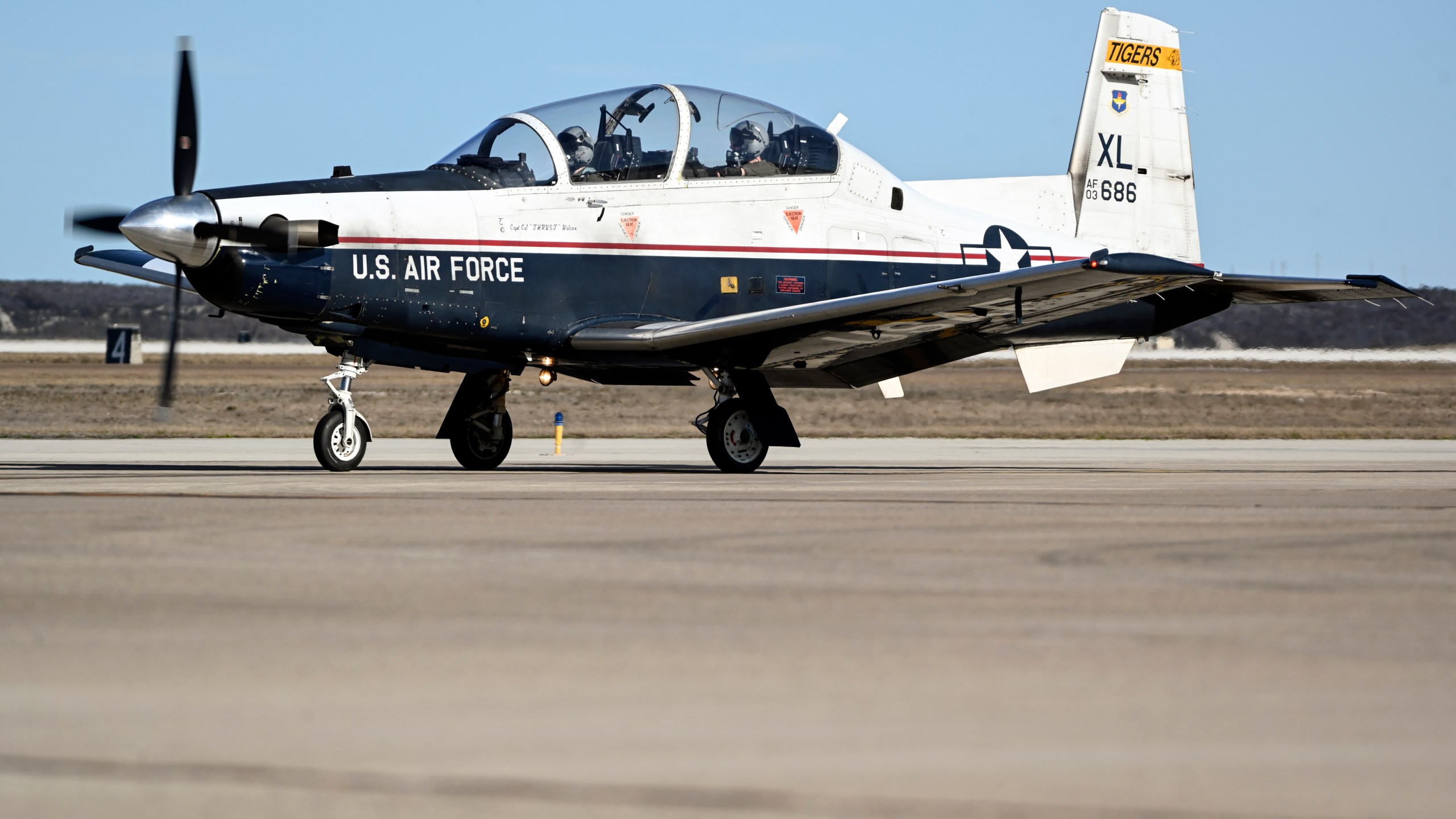 This image provided by the U.S. Air Force shows a U.S. Air Force T-6A Texan II taxiing down the flight line at Laughlin Air Force Base, Texas, on Jan. 26, 2024. The Air Force says an instructor pilot was killed when the ejection seat activated while the jet was still on the ground at Sheppard Air Force Base in Wichita Falls, Texas, when the seat activated during ground operations on May 13. (Airman 1st Class Keira Rossman/U.S. Air Force via AP)