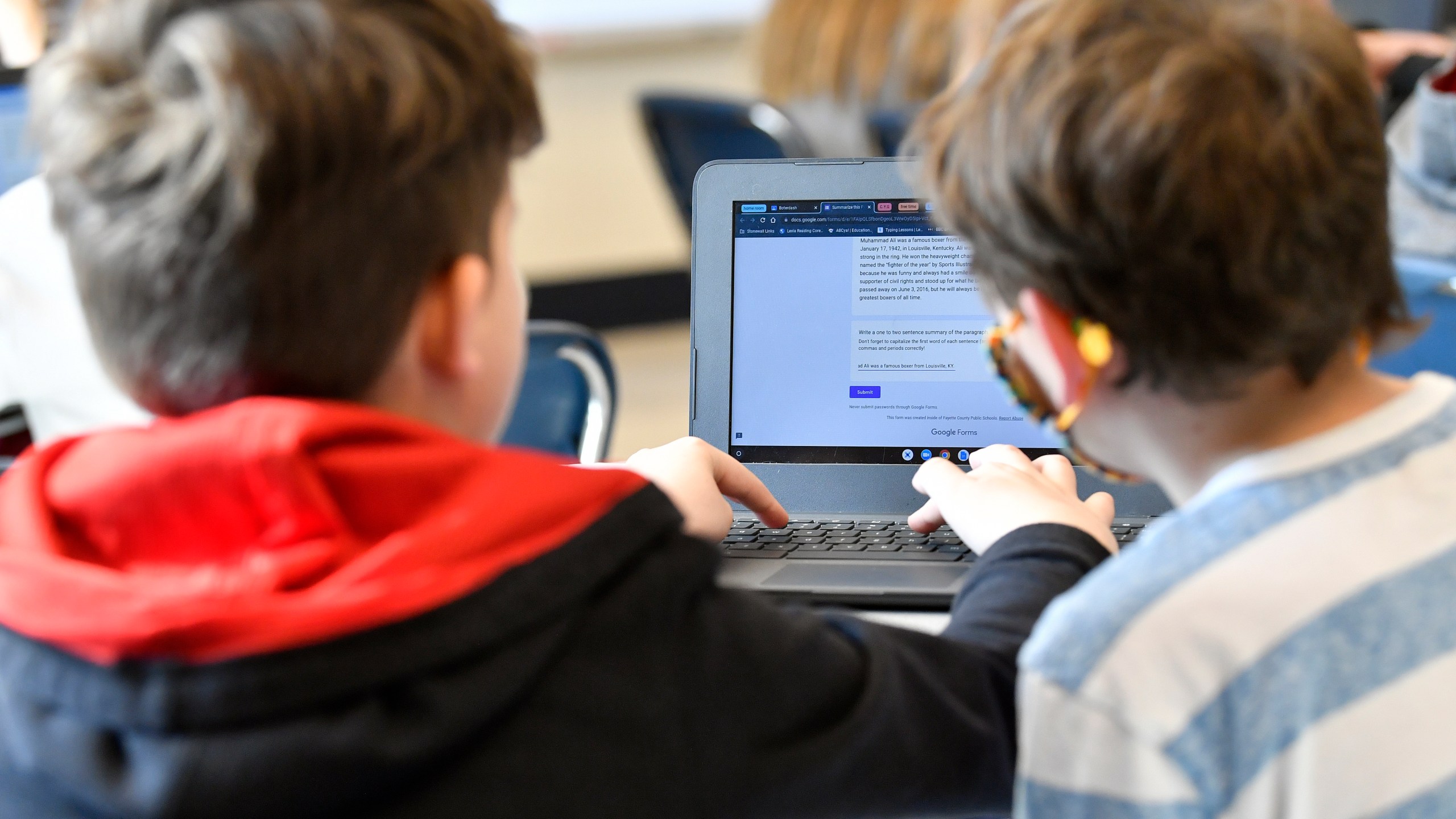 FILE - Students work on a laptop computer at Stonewall Elementary in Lexington, Ky., Feb. 6, 2023. A bill aiming to protect kids from the harms of social media, gaming sites and other online platforms appears to have enough bipartisan support to pass, though whether it actually will remains uncertain. (AP Photo/Timothy D. Easley, File)