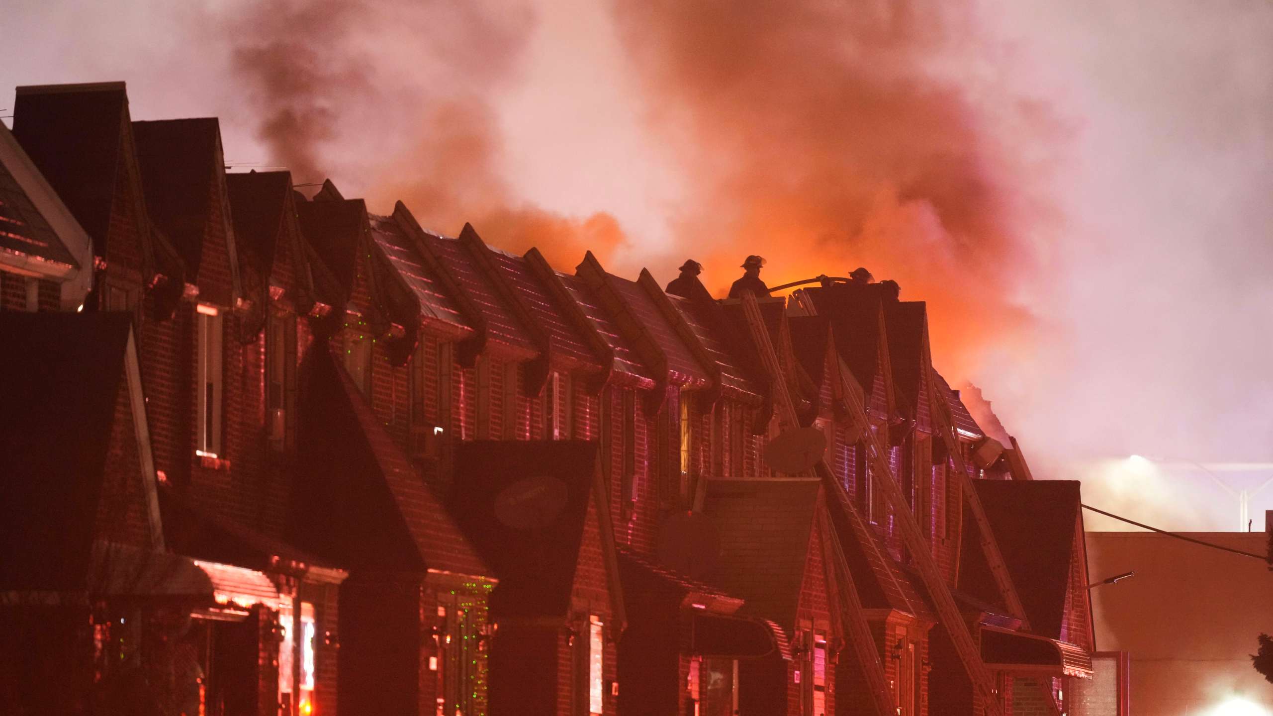 First responders work the scene after a small plane crashed in Philadelphia, Friday, Jan. 31, 2025. (AP Photo/Matt Rourke)