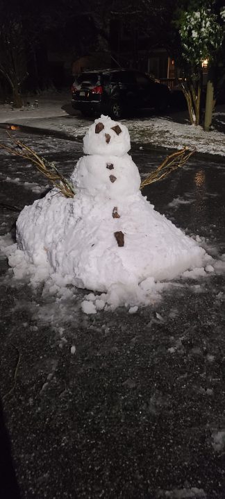 A snow person in Hampton (Stephen Taylor)
