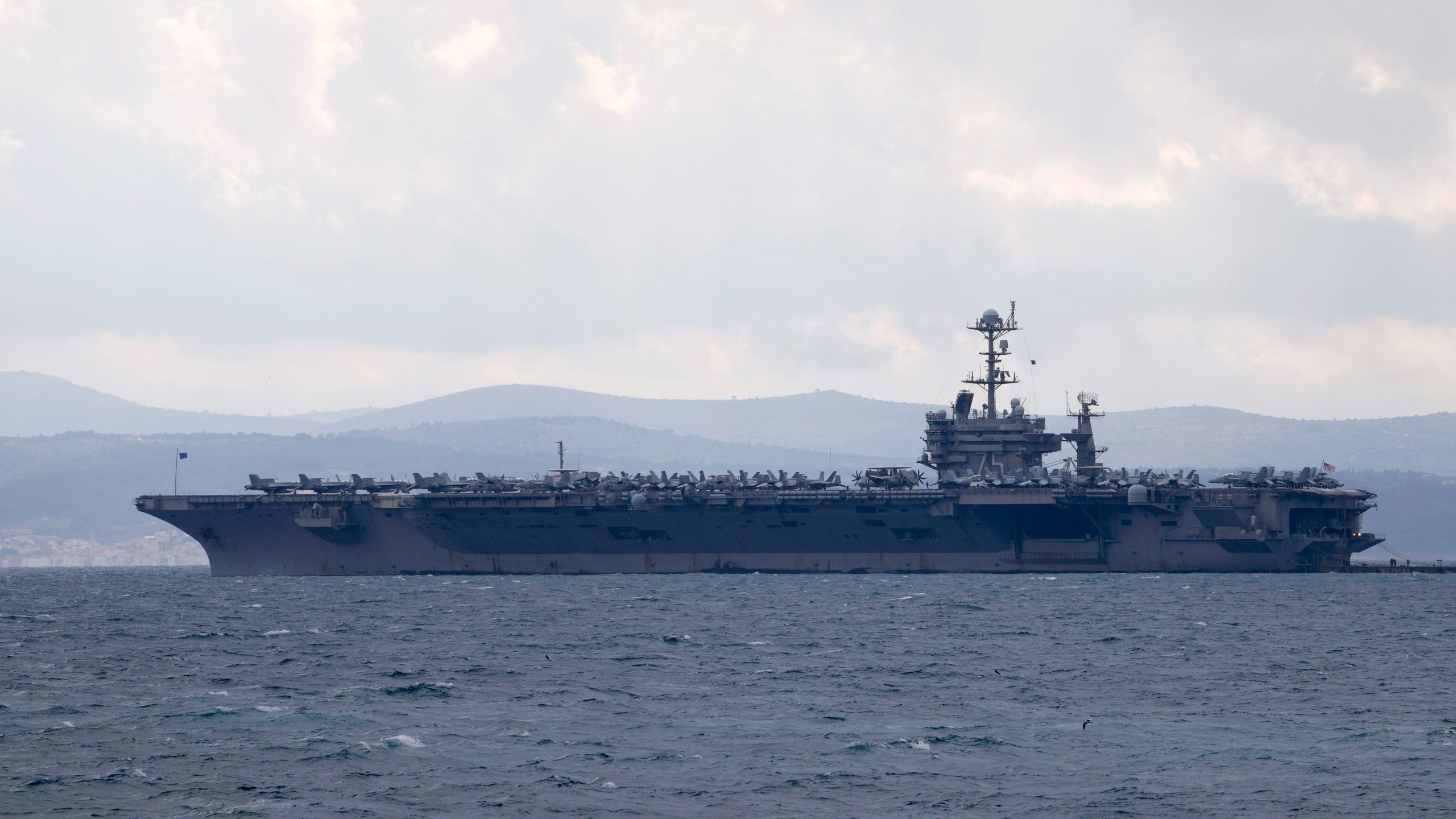 FILE - Aircraft carrier USS Harry S. Truman is moored near Split, Croatia, Feb. 14, 2022. (AP Photo/Darko Bandic, File)