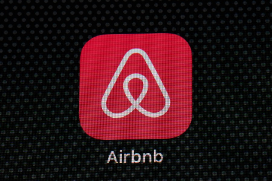 FILE - The Airbnb app icon is displayed on an iPad screen in Washington, D.C., May 8, 2021. (AP Photo/Patrick Semansky, File)