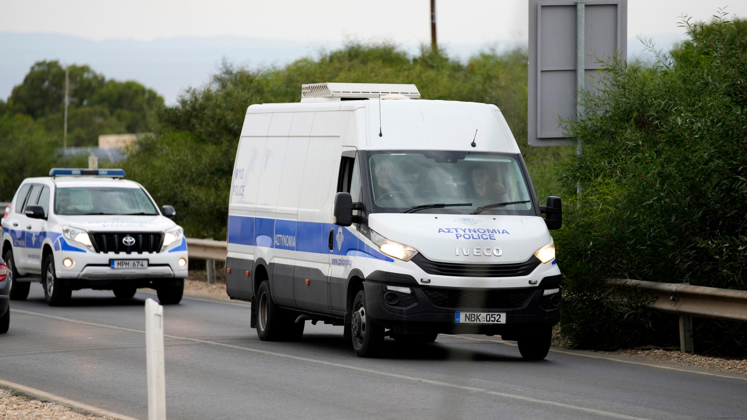 FILE - The police van carrying the five Israelis who are accused of raping a British woman, arrives at the Famagusta District Courthouse in Paralimni, Cyprus, on Sept. 12, 2023. (AP Photo/Petros Karadjias, File)