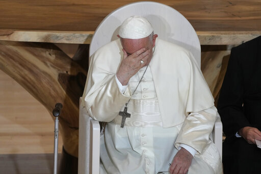 FILE - Pope Francis sits during a meeting with Indigenous peoples and members of the parish community of Sacred Heart in Edmonton, Canada, Monday, July 25, 2022. (AP Photo/Gregorio Borgia, File)
