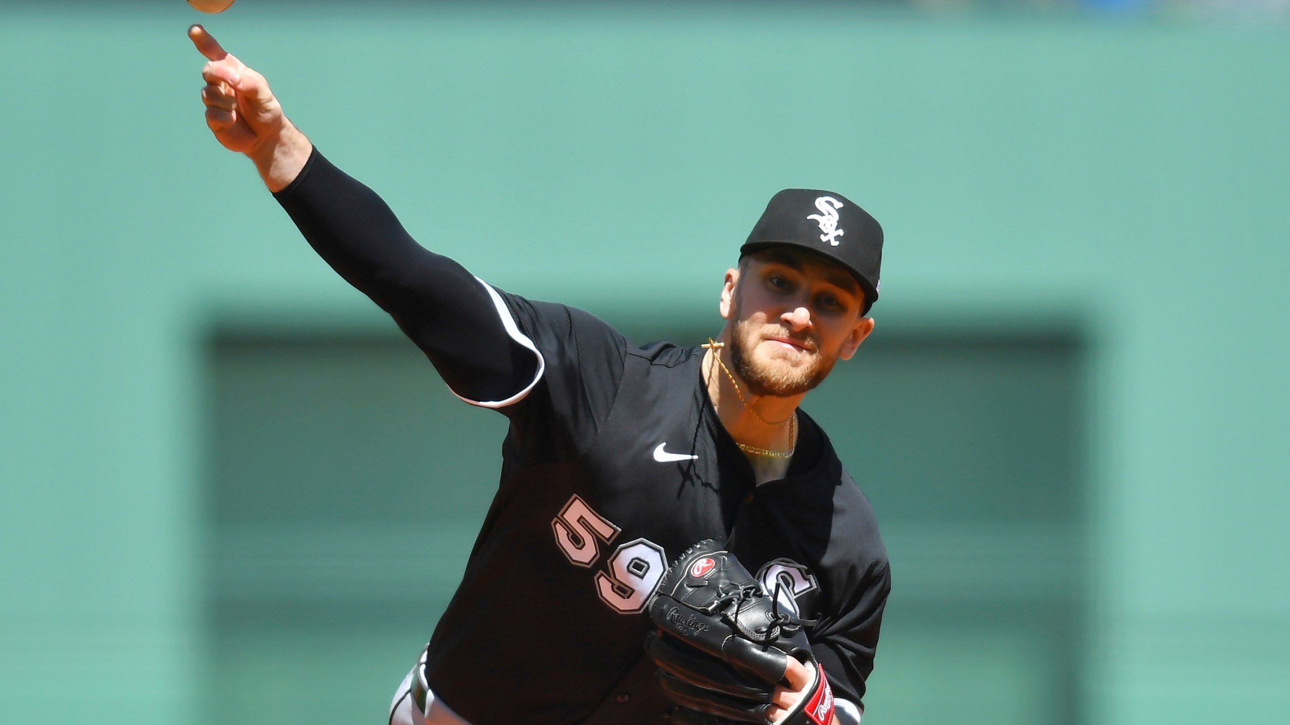 Chicago White Sox's Sean Burke delivers a pitch to a Boston Red Sox batter in the first inning of a baseball game, Sunday, April 20, 2025, in Boston. (AP Photo/Steven Senne)