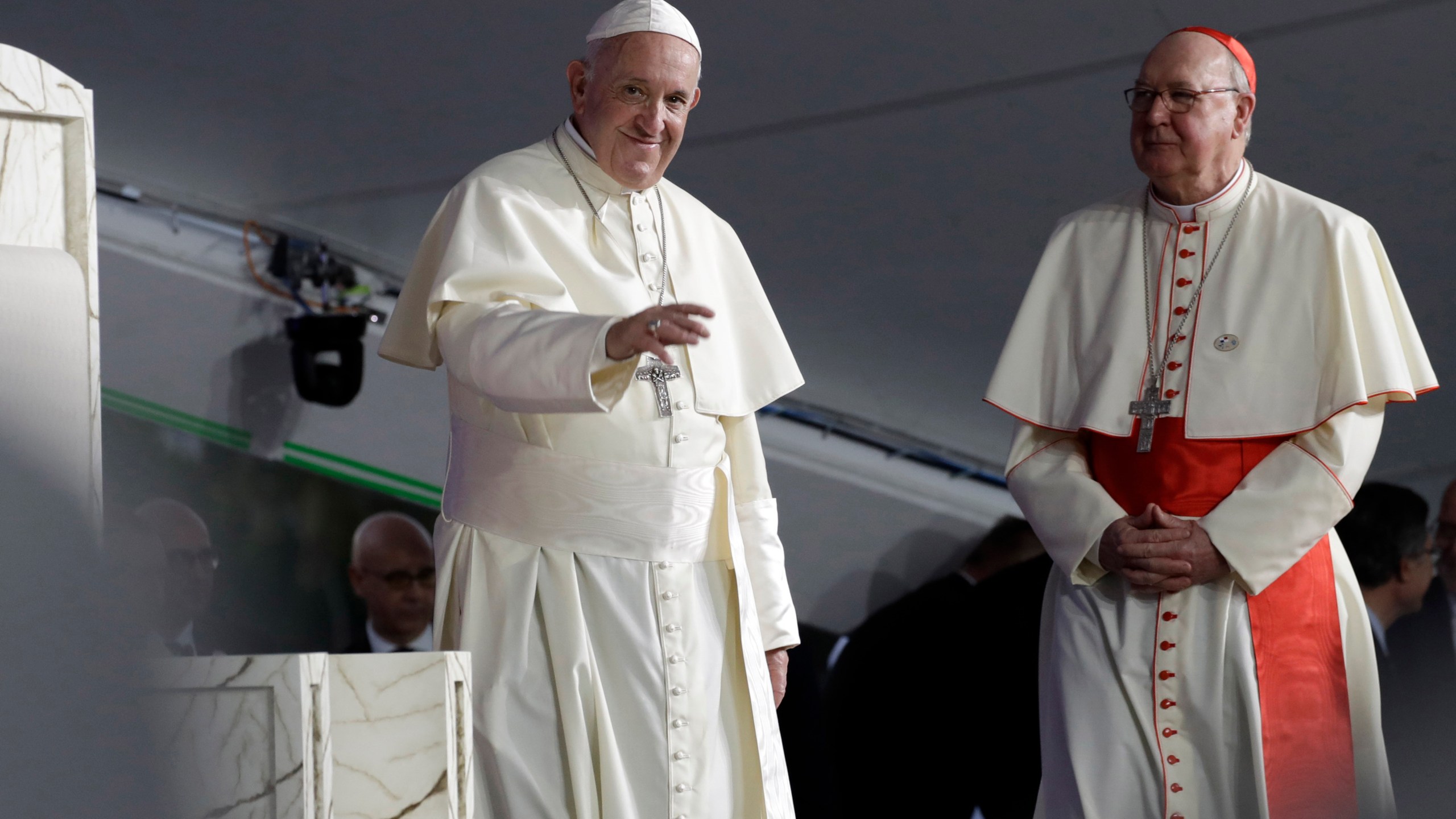 FILE - Pope Francis, left, is flanked by Cardinal Kevin Farrell during a vigil at Campo San Juan Pablo II in Panama City, Jan. 26, 2019. (AP Photo/Alessandra Tarantino, File )