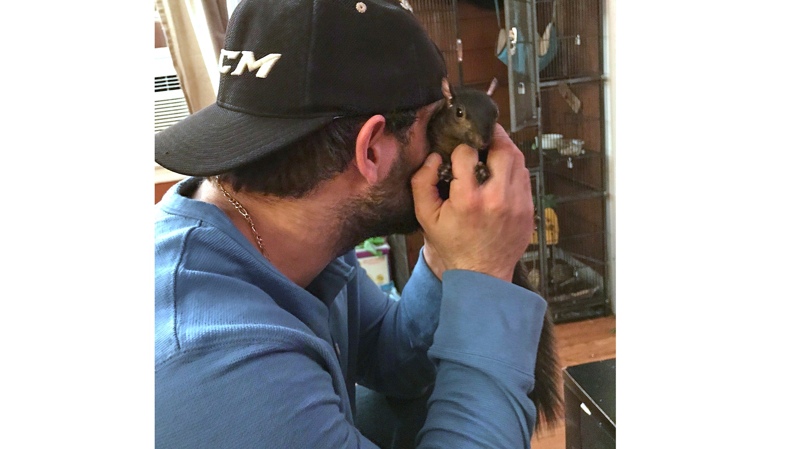 This December 2017 photo shows Mark Longo with Peanut, a squirrel who lived as a pet Longo in Southport, N.Y. (Mark Longo via AP))