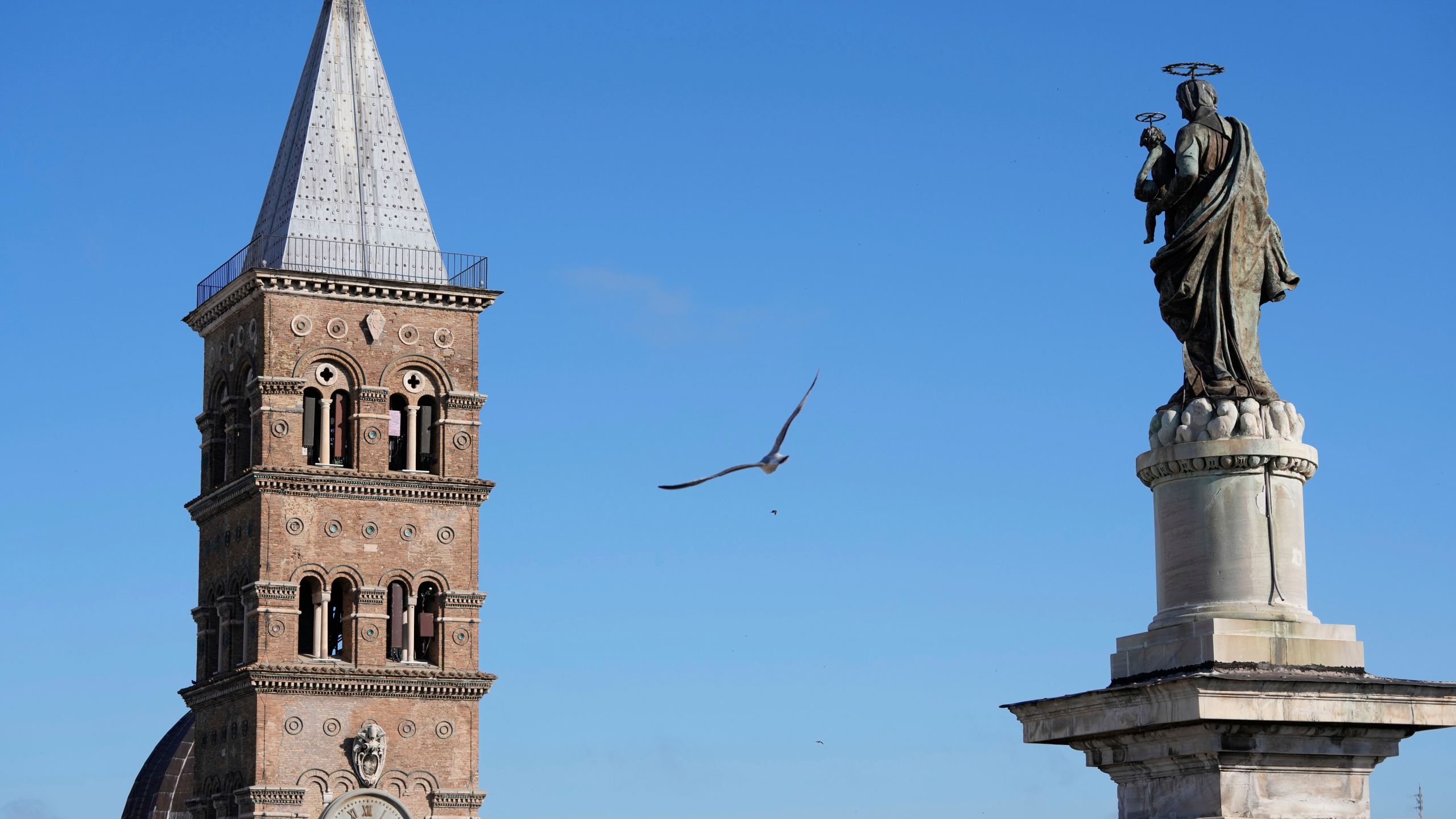 The bell tower of St. Mary Major Basilica, where the burial ceremony of Pope Francis will take place, in Rome, Saturday, April 26, 2025. (AP Photo/Luca Bruno)