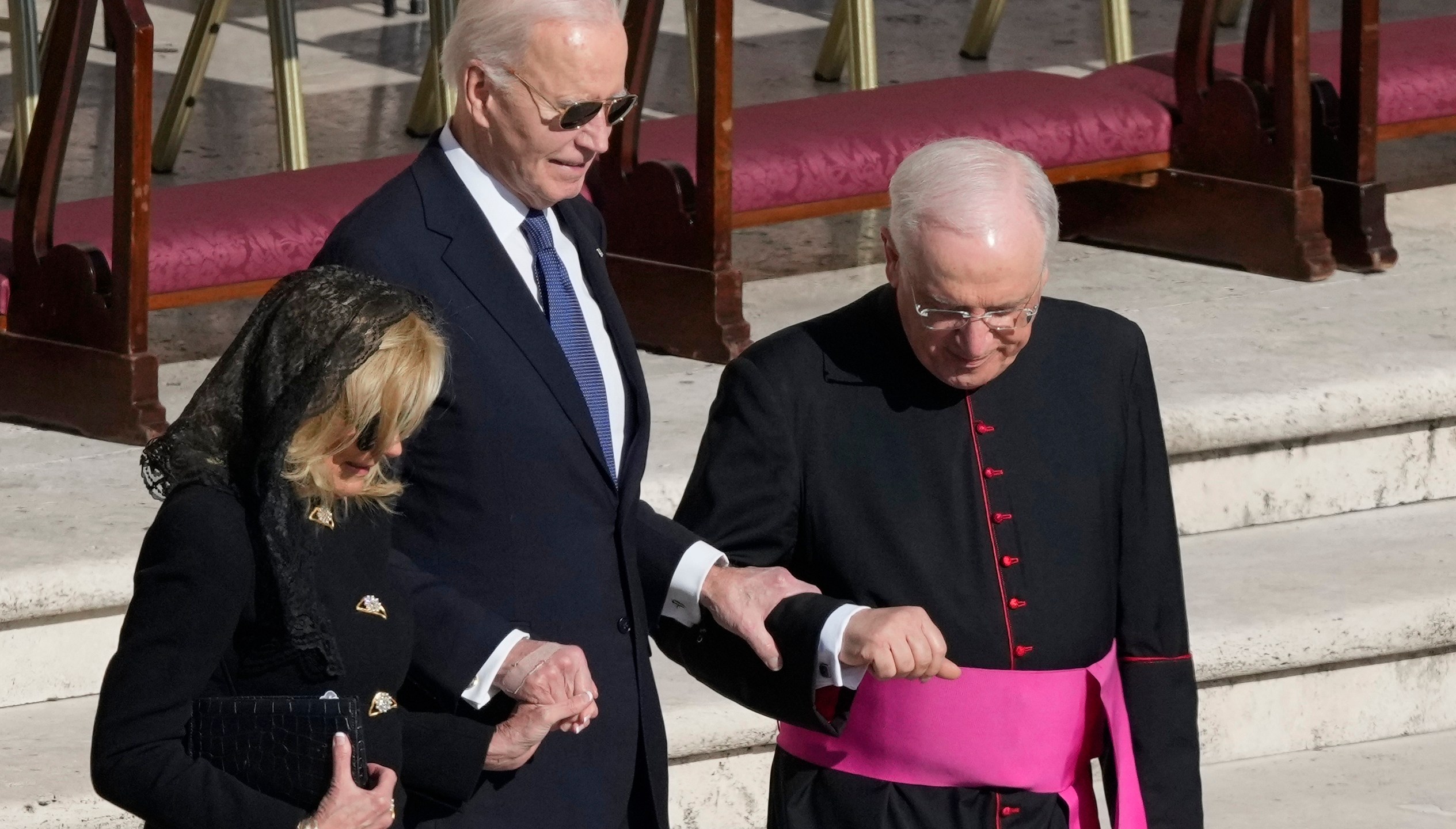 Former President Joe Biden, center, and his wife Jill arrive for the funeral of Pope Francis in St. Peter's Square at the Vatican, Saturday, April 26, 2025. (AP Photo/Gregorio Borgia)