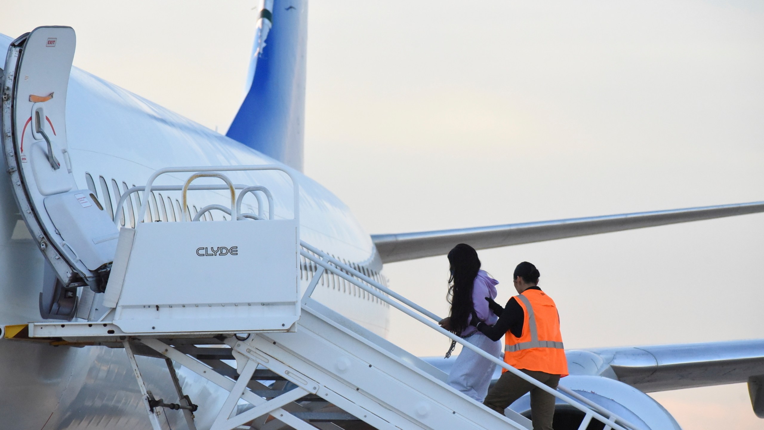 FILE - Venezuelan migrants board a plane heading back to their home country from Harlingen, Texas, on Wednesday, Oct. 18, 2023. (AP Photo/Valerie Gonzalez, File)