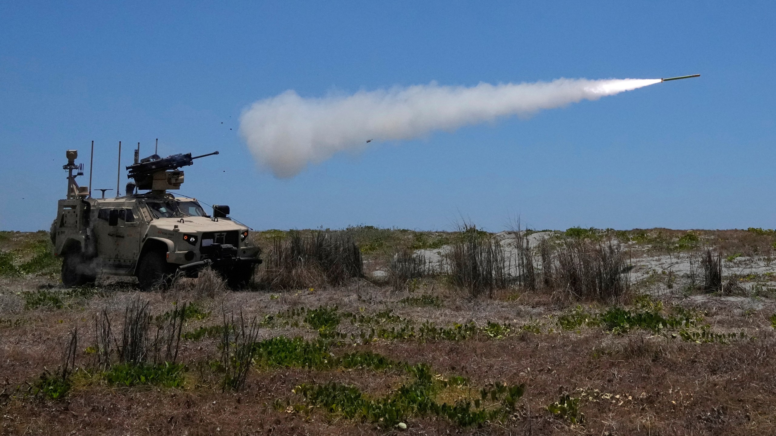A U.S. Marine Air Defense Integrated System, or MADIS, fires at a drone during a live-fire joint Philippines-U.S. military exercise at the Philippine Navy training camp in San Antonio, Zambales province, northern Philippines Sunday, April 27, 2025. (AP Photo/Aaron Favila)