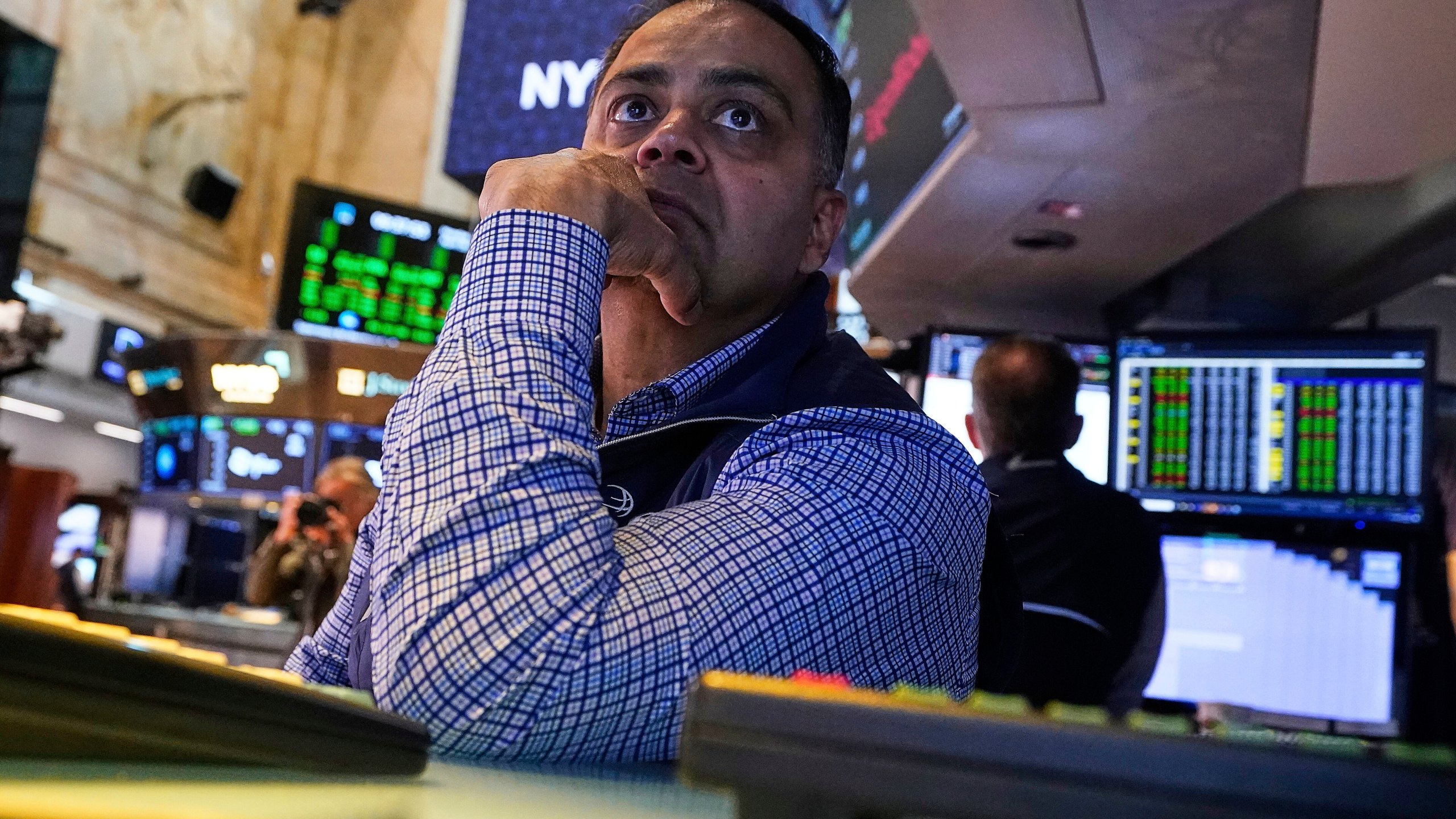 Specialist Dilip Patel works at his post on the floor of the New York Stock Exchange, Monday, April 28, 2025. (AP Photo/Richard Drew)