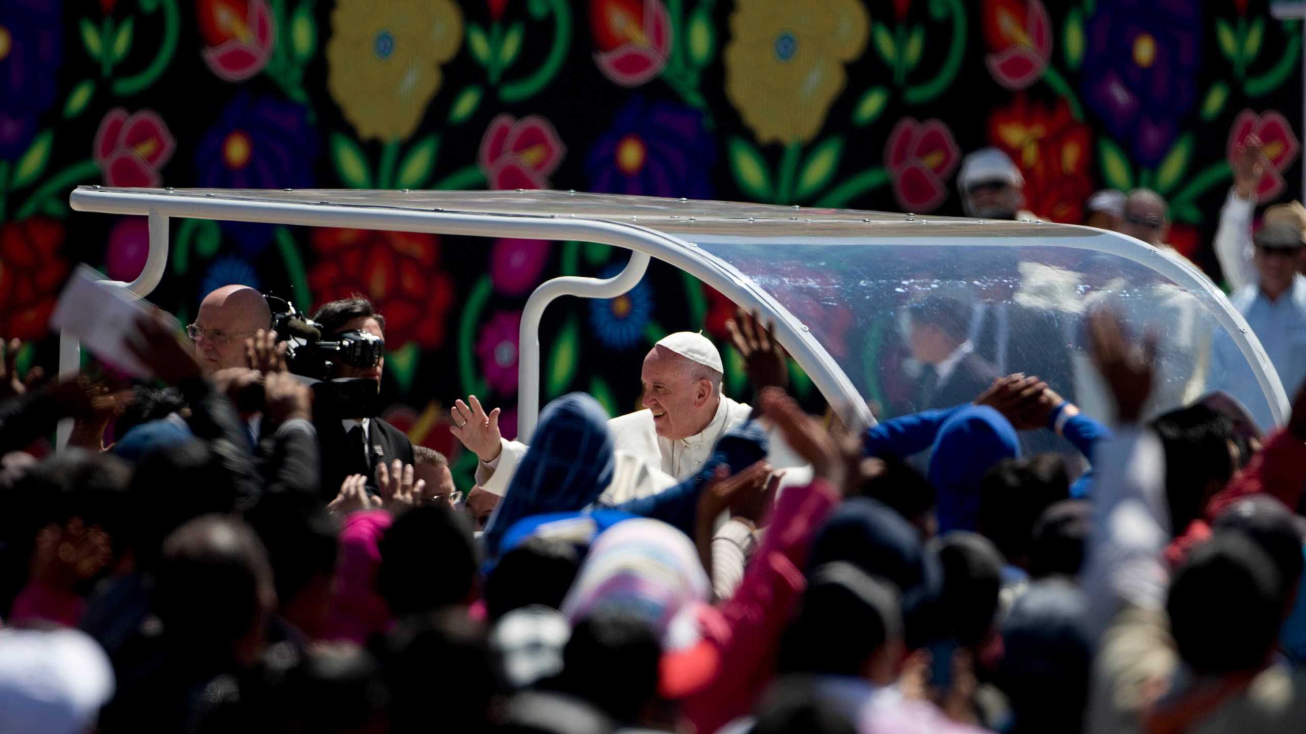 FILE - Pope Francis waves to the crowd after celebrating Mass in San Cristobal de las Casas, Mexico, Feb. 15, 2016. (AP Photo/Eduardo Verdugo, File)