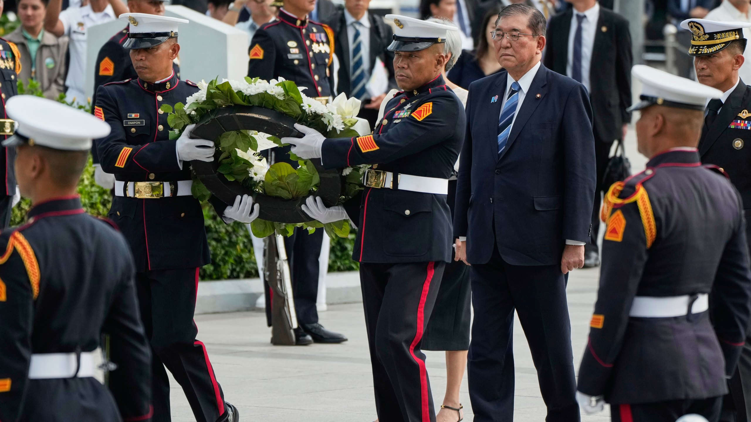 Japanese Prime Minister Shigeru Ishiba lays a wreath at the monument of Philippine National Hero Jose Rizal in Manila, Philippines on Tuesday, April 29, 2025. (AP Photo/Aaron Favila)