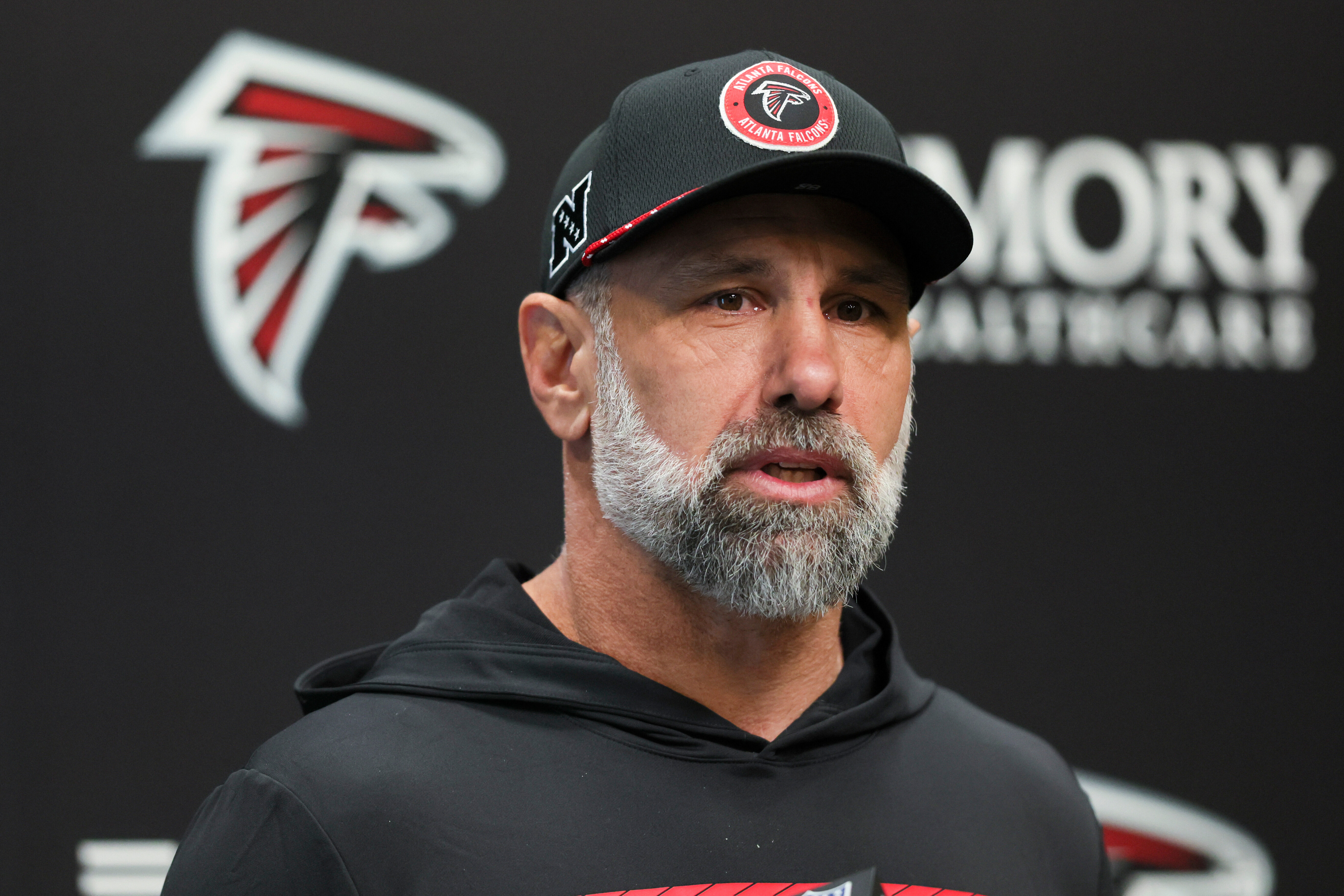 FILE - Atlanta Falcons defensive coordinator Jeff Ulbrich speaks with members of the media at the Falcons Training Camp, Jan. 27, 2025, in Flowery Branch, Ga. (Jason Getz/ Atlanta Journal-Constitution via AP, File)