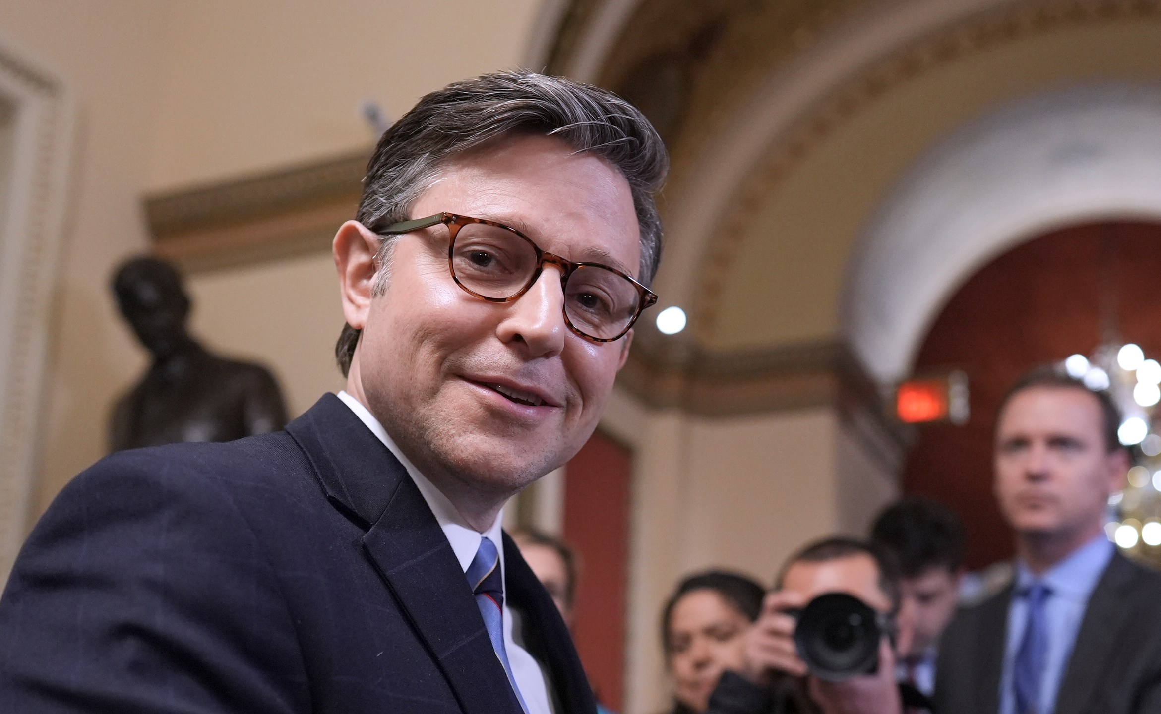 Speaker of the House Mike Johnson, R-La., talks to reporters just after House Republicans narrowly approved their budget framework, at the Capitol in Washington, Thursday, April 10, 2025. (AP Photo/J. Scott Applewhite)