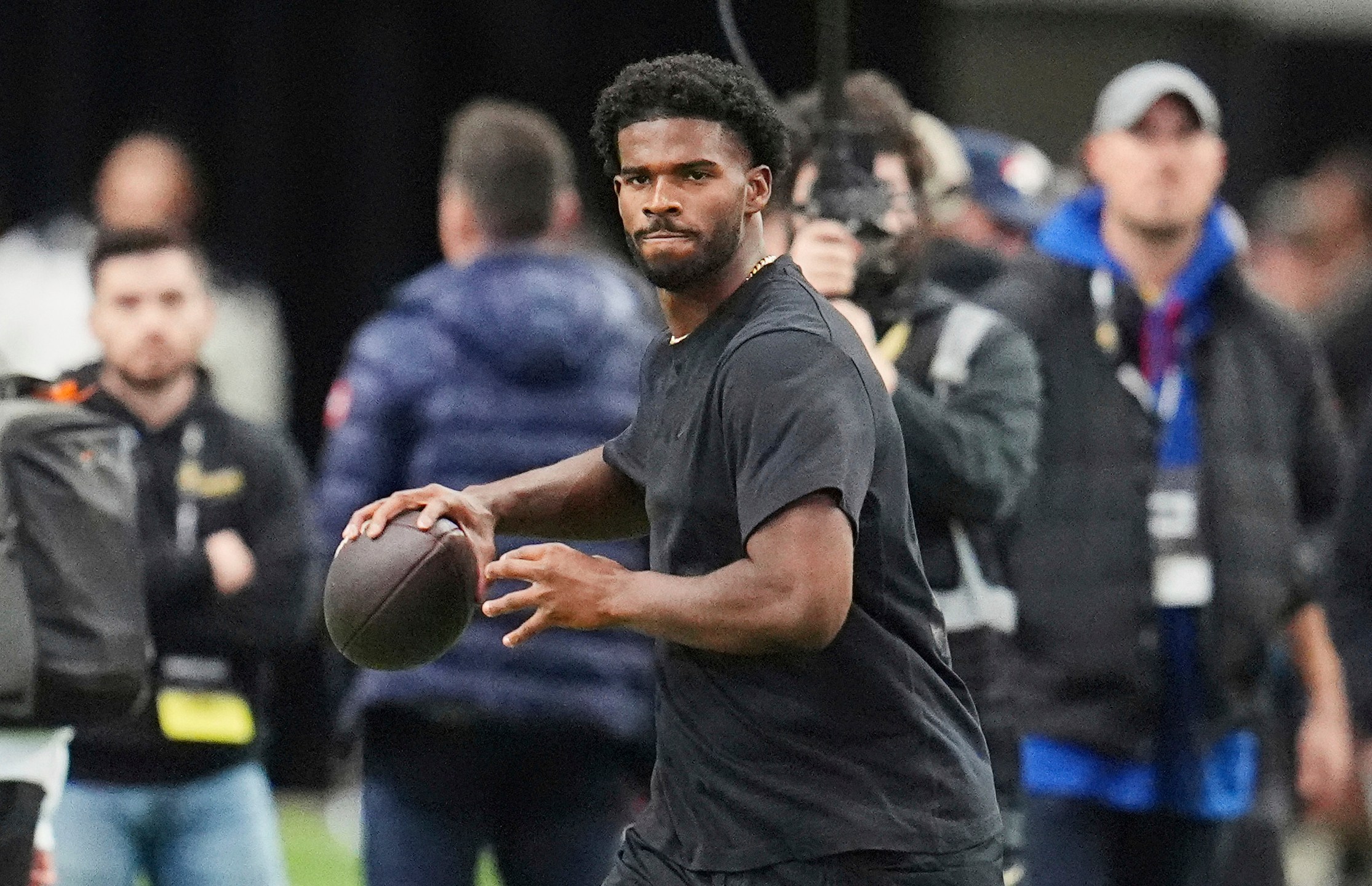 FILE - Colorado quarterback Shedeur Sanders takes part in passing drills during Colorado's NFL football pro day Friday, April 4, 2025, in Boulder, Colo. (AP Photo/David Zalubowski, File)