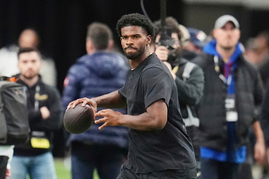 FILE - Colorado quarterback Shedeur Sanders takes part in passing drills during Colorado's NFL football pro day Friday, April 4, 2025, in Boulder, Colo. (AP Photo/David Zalubowski, File)