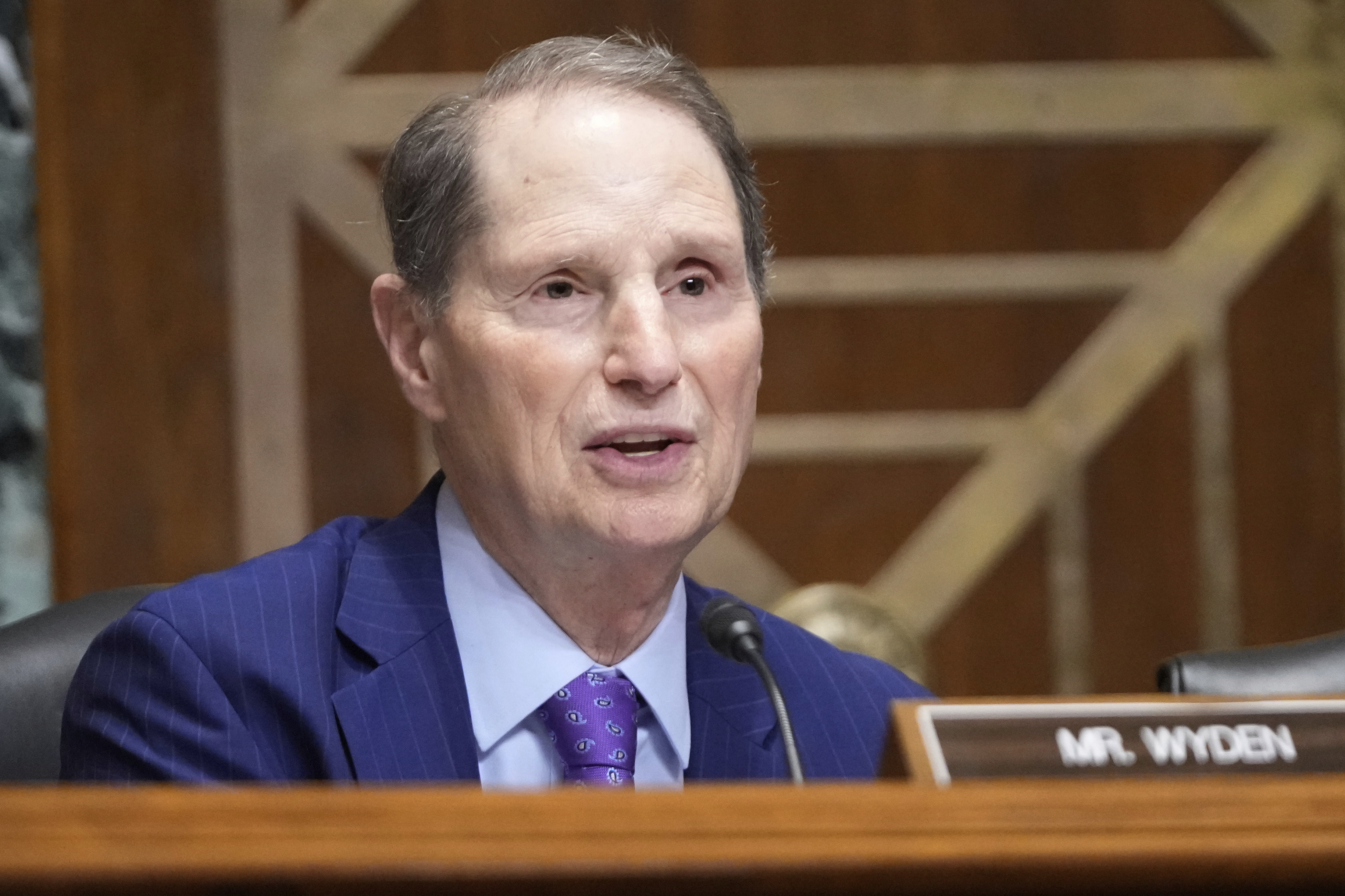 Sen. Ron Wyden, D-Ore., questions U.S. Trade Representative Jamieson Greer as he testifies before the Senate Finance Committee on Capitol Hill in Washington, Tuesday, April 8, 2025. (AP Photo/Mark Schiefelbein)