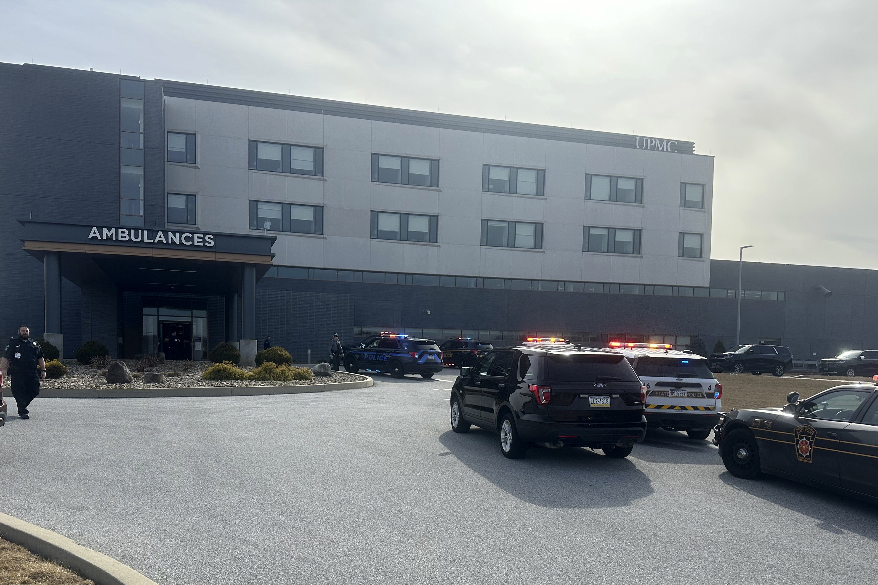 FILE - Law enforcement arrive at the scene of a shooting at UPMC Memorial Hospital in York, Pa., Feb. 22, 2025. (AP Photo/Mark Scolforo, File)