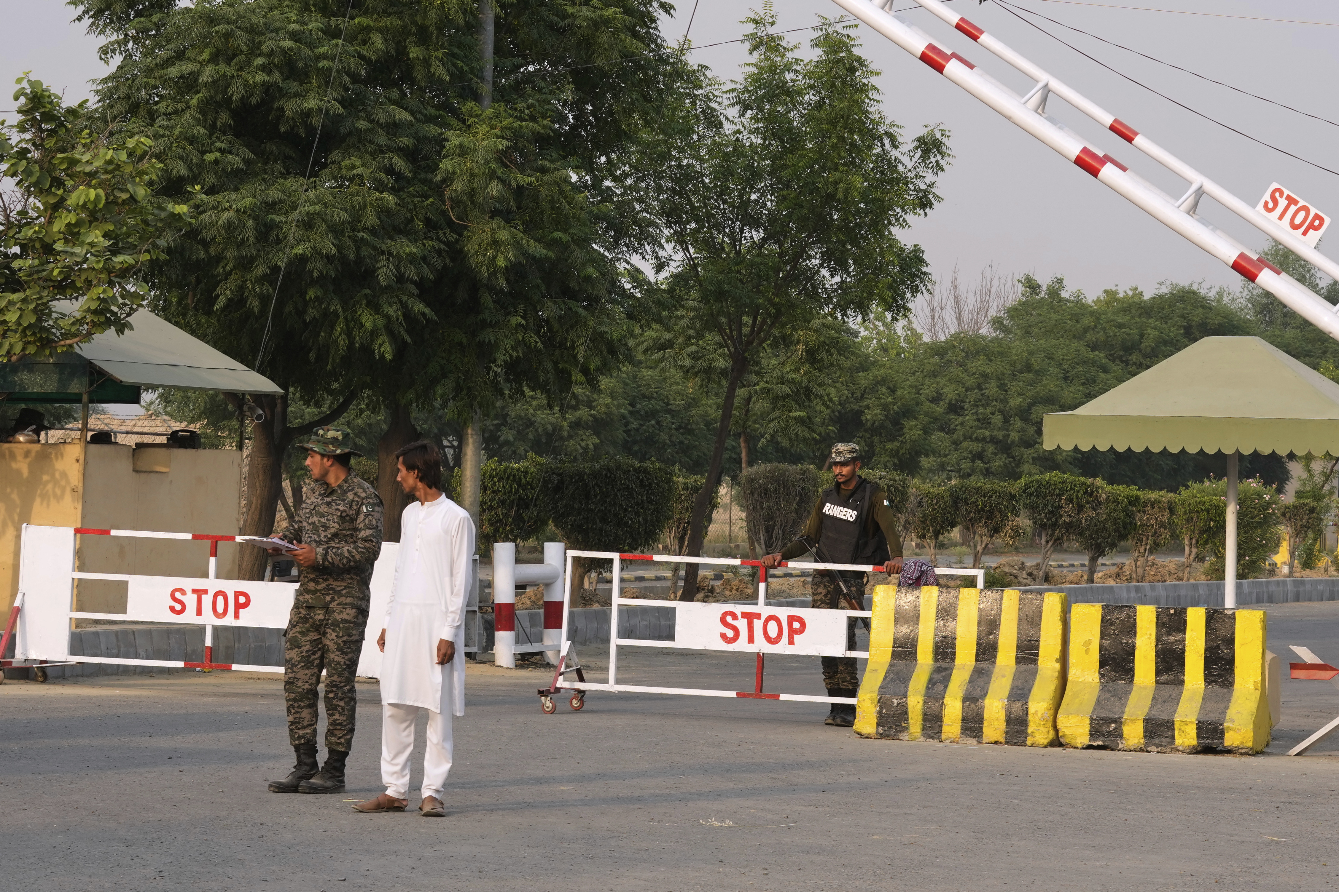Pakistani paramilitary soldiers stand guard at a checkpoint in Wagah, a joint border crossing point on the Pakistan and India border, near Lahore, Pakistan, Wednesday, April 30, 2025.(AP Photo/K.M. Chaudary)