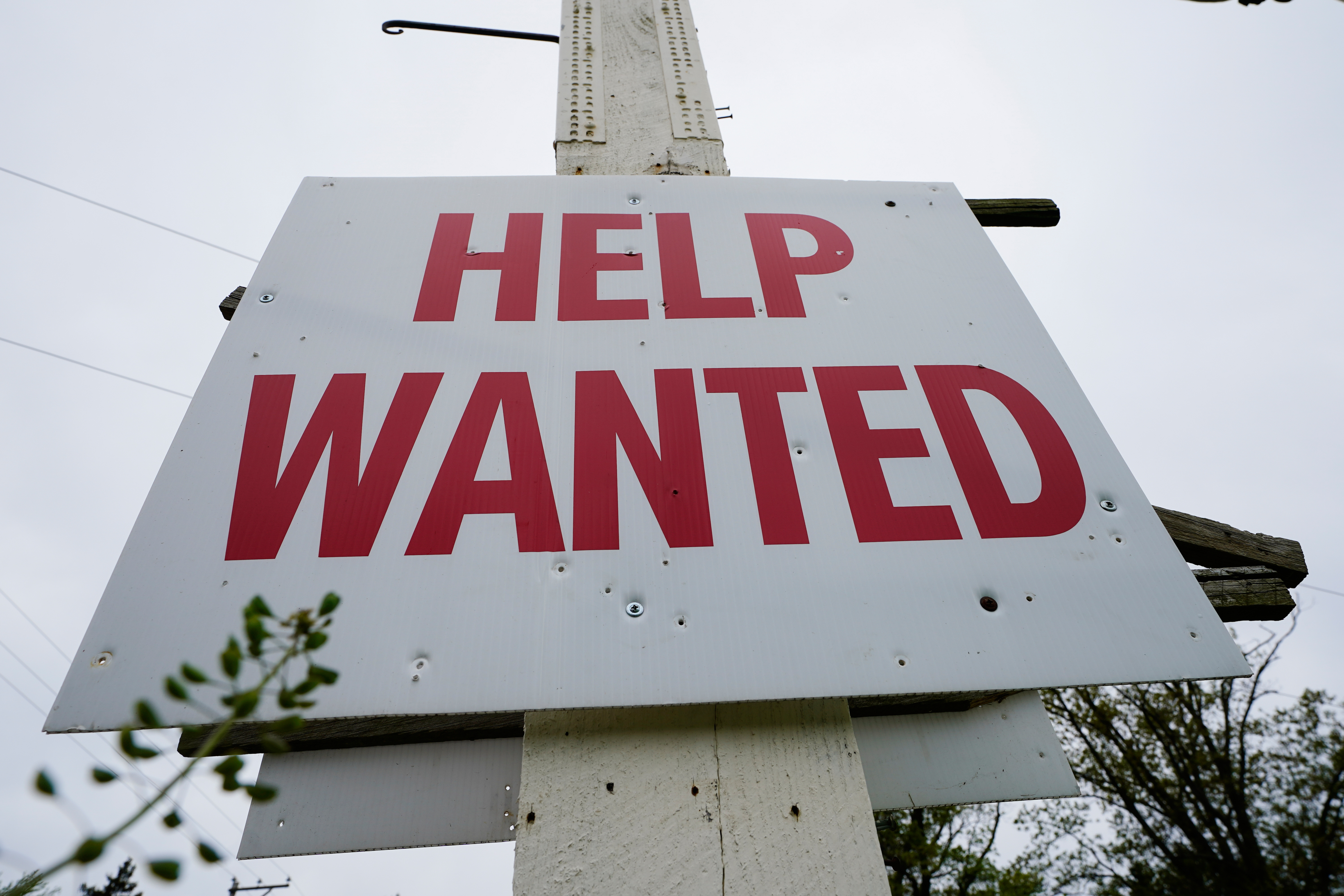 FILE - A help wanted sign is posted in Lansdale, Pa., Friday, April 28, 2023. (AP Photo/Matt Rourke, File)