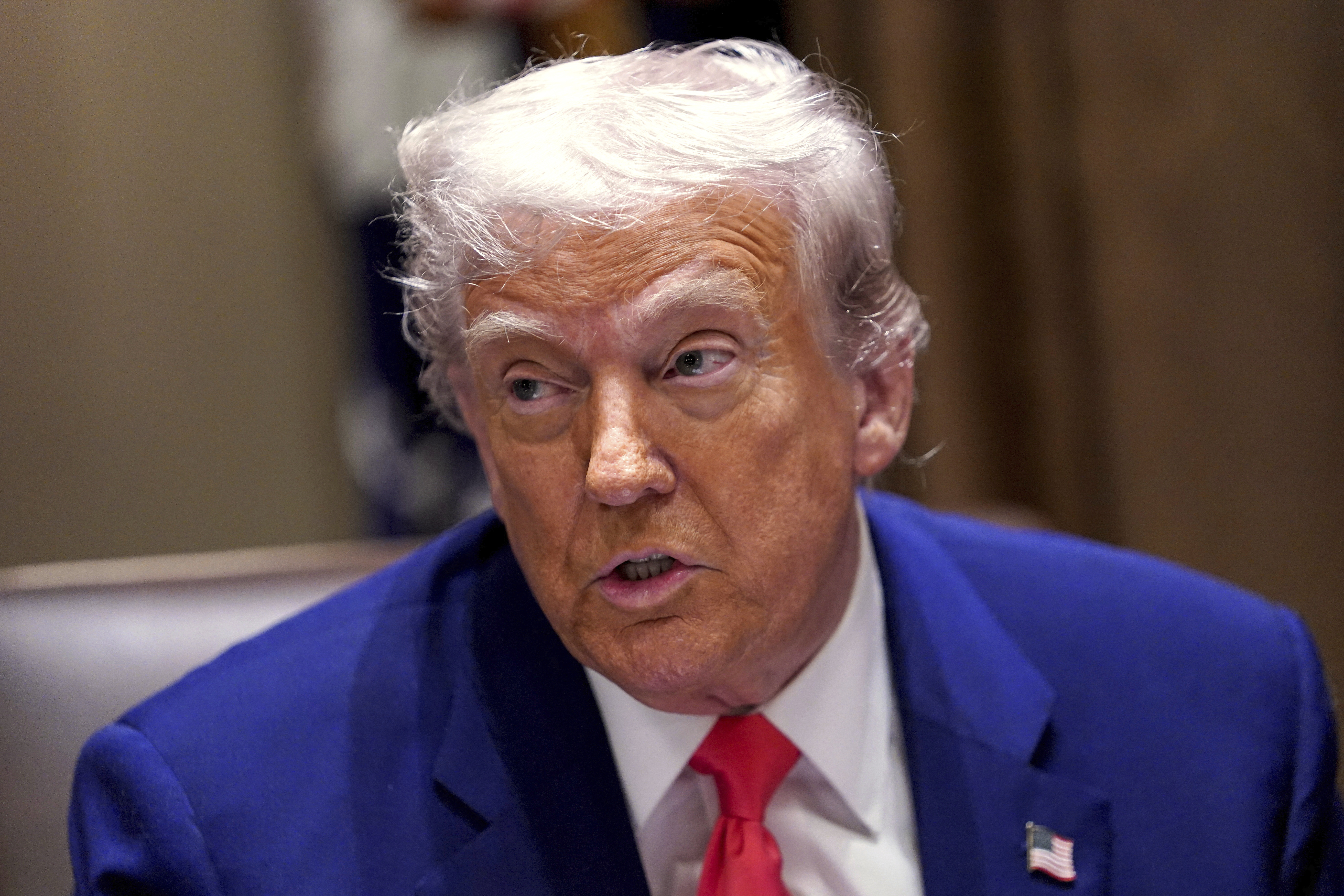 President Donald Trump speaks at a cabinet meeting in the Cabinet Room of the White House, Thursday, April 10, 2025, in Washington. (Pool via AP)