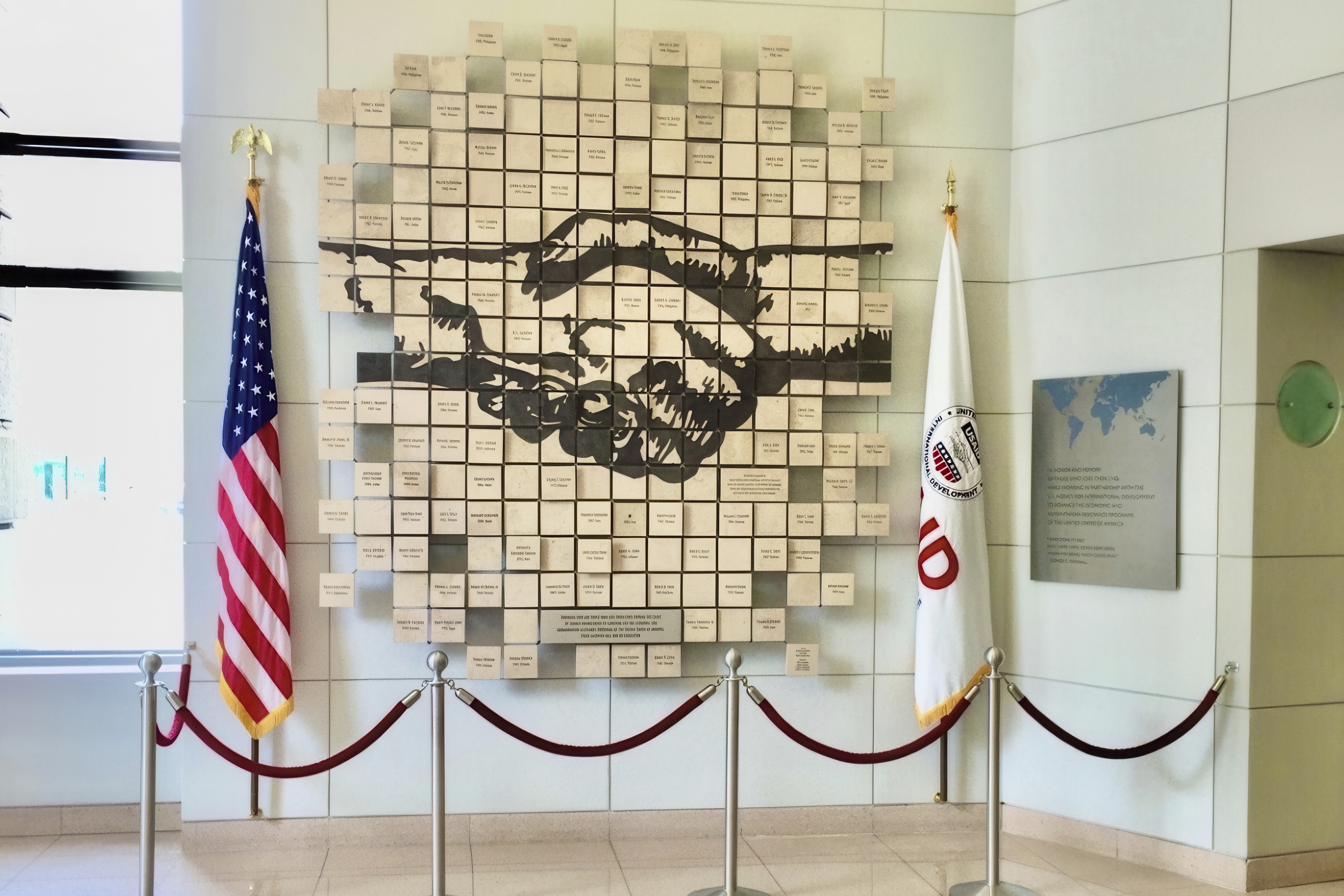 The United States Agency for International Development memorial wall to fallen staffers is photographed at the agency's headquarters in May 2016, in Washington. (AP Photo)