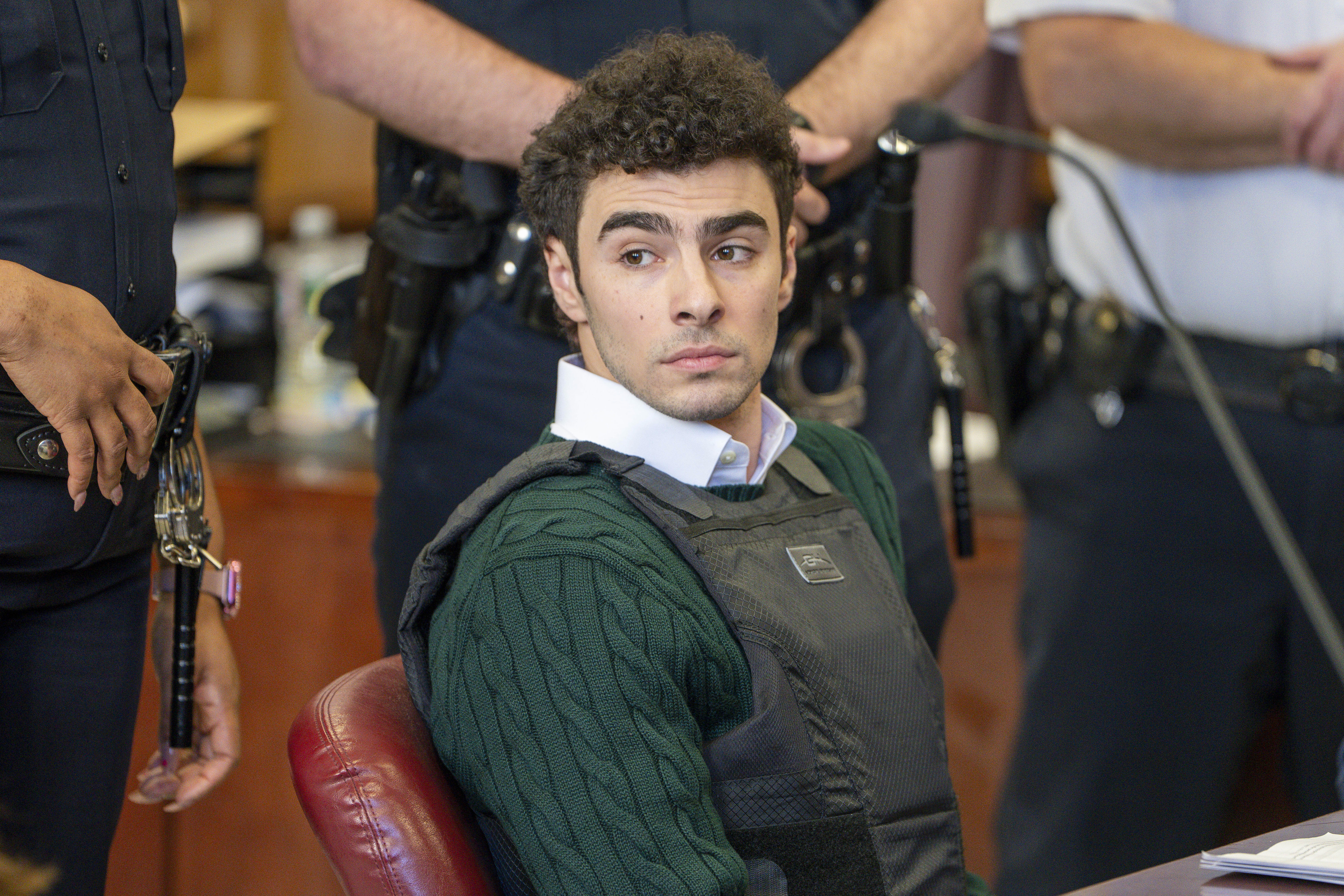 FILE - Luigi Mangione , accused of fatally shooting the UnitedHealthcare CEO Brian Thompson in New York City and leading authorities on a five-day search is scheduled, appears in court for a hearing, Friday, Feb. 21, 2025, in New York. (Steven Hirsch/New York Post via AP, Pool, File)