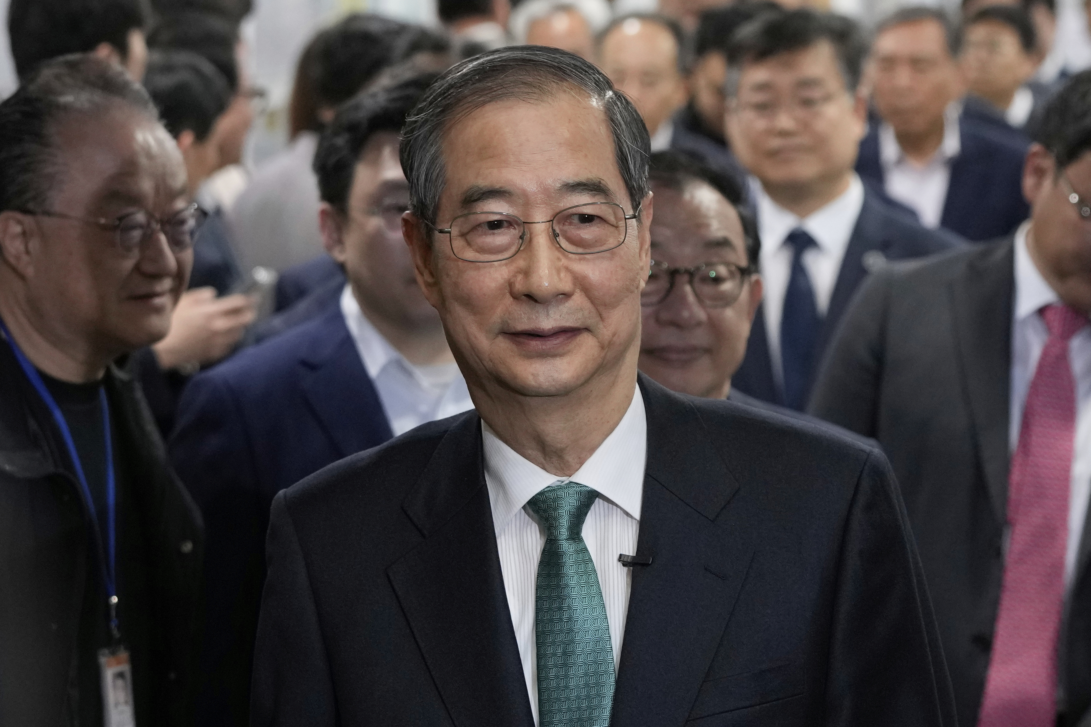South Korean former Prime Minister Han Duck-soo arrives to hold a press conference to announce a presidential bid at the National Assembly in Seoul, South Korea, Friday, May 2, 2025. (AP Photo/Ahn Young-joon)