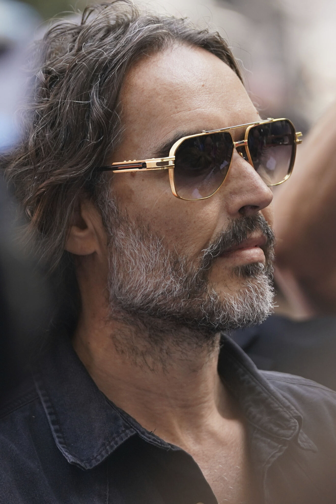 Russell Brand arrives at Westminster Magistrates' court in London, Friday, May 2, 2025, where he faces, rape and sexual assault charges involving four women. (AP Photo/Alberto Pezzali)