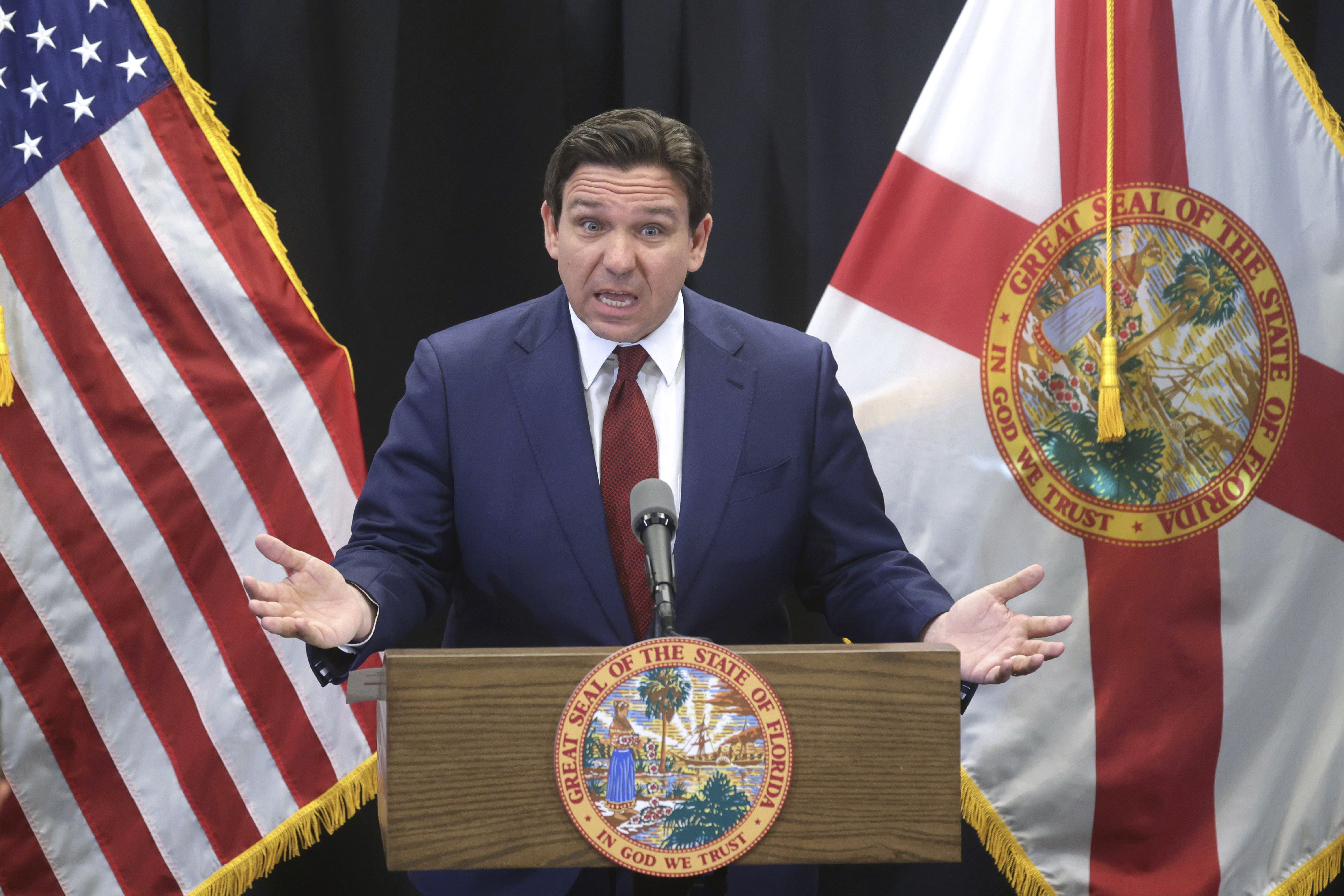 FILE - Florida Gov. Ron DeSantis delivers remarks during a press conference at the Central Florida Tourism Oversight District headquarters at Walt Disney World, in Lake Buena Vista, Fla., Thursday, Feb. 22, 2024. (Joe Burbank/Orlando Sentinel via AP, File)