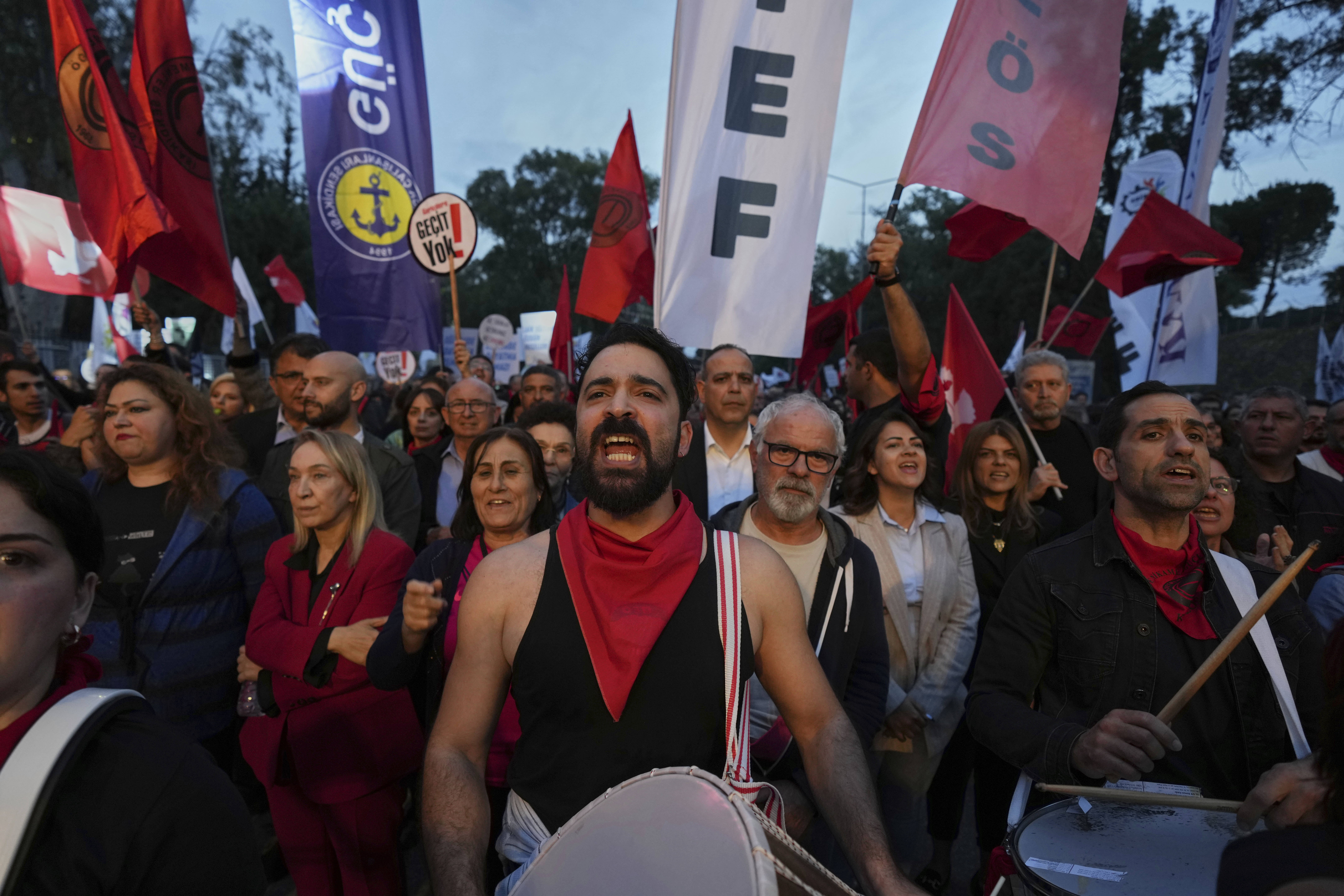 Several thousand Turkish Cypriots took to the streets of the northern half of ethnically divided Cyprus' capital Nicosia to protest what they say is Turkey's attempt to erode their secular roots and to strengthen the hold of political Islam over their society, on Friday, May 2, 2025. (AP Photo/Petros Karadjias)