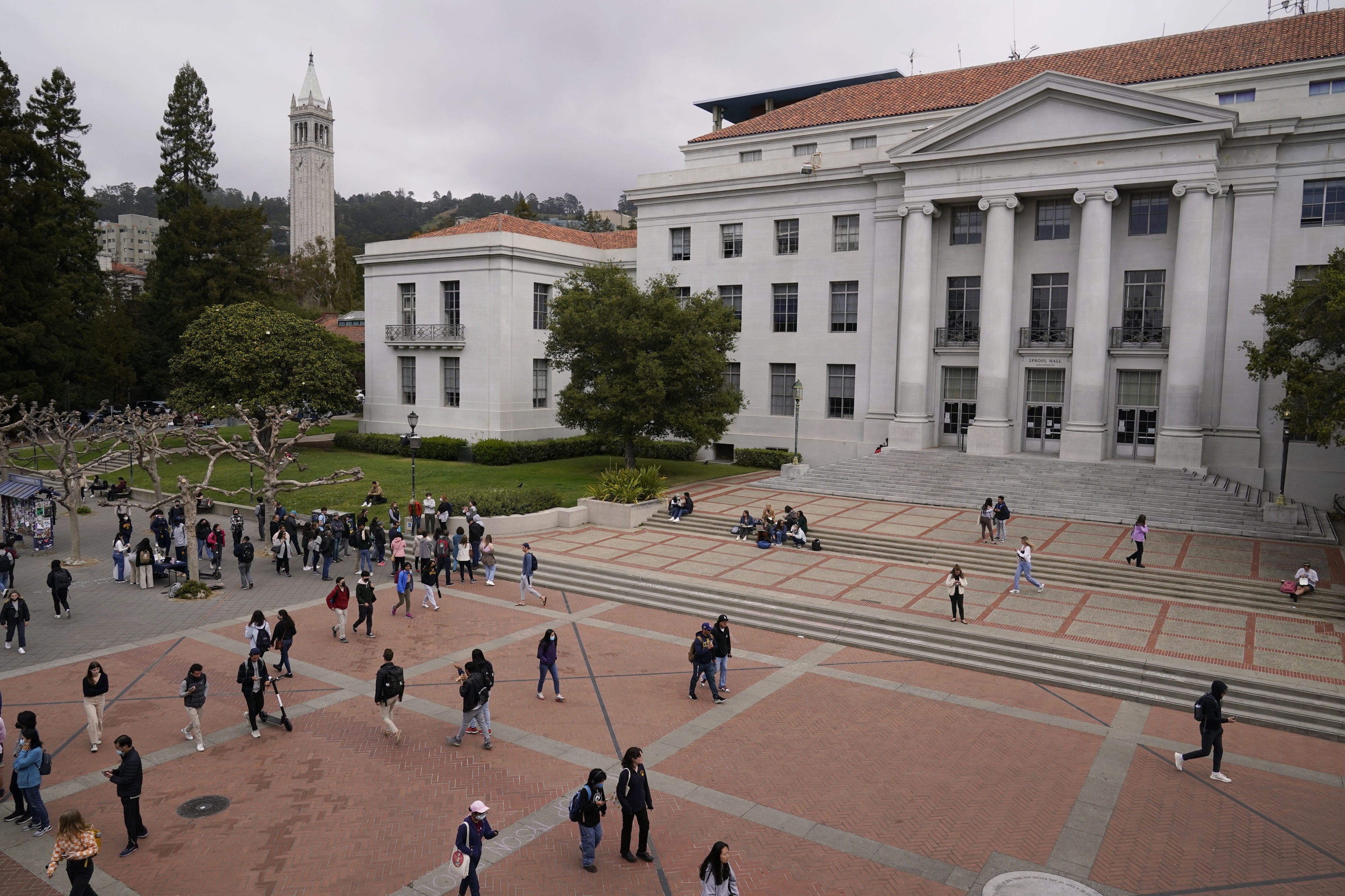 FILE - Students walk through Sproul Plaza on the University of California, Berkeley campus on March 29, 2022, in Berkeley, Calif. (AP Photo/Eric Risberg, File)