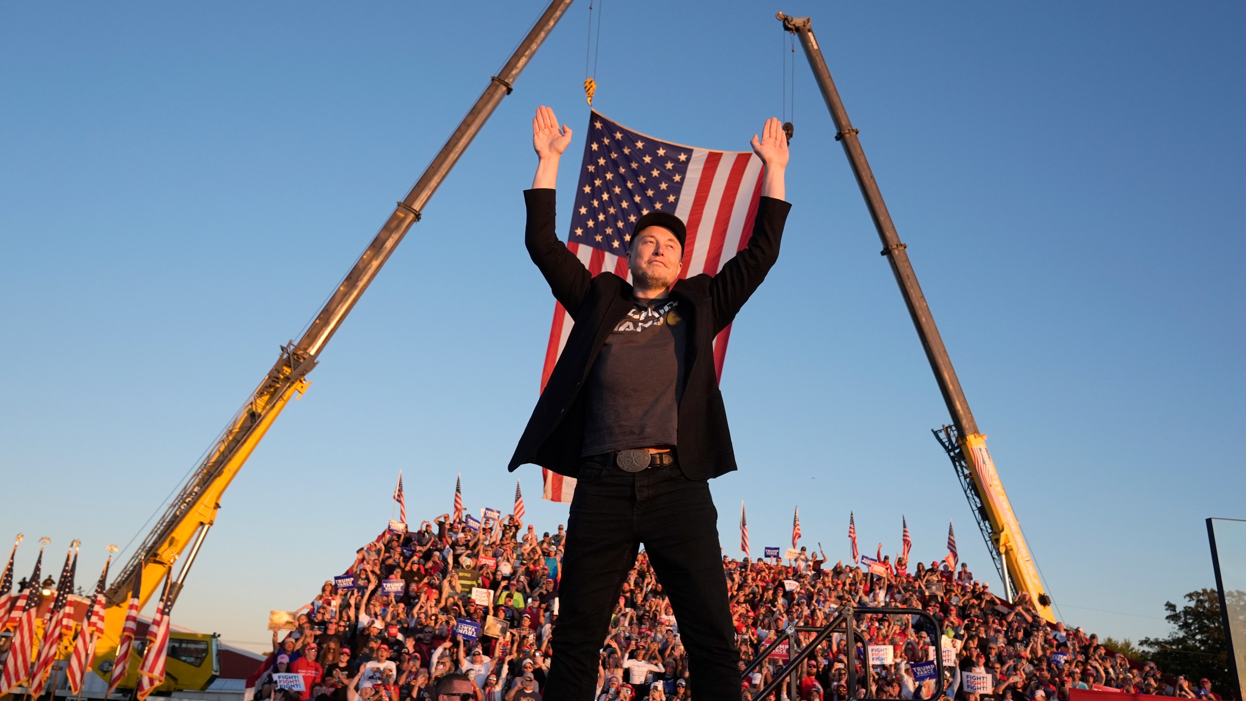 FILE - Tesla and SpaceX CEO Elon Musk walks to the stage to speak at the Butler Farm Show, Oct. 5, 2024, in Butler, Pa. (AP Photo/Alex Brandon, file)