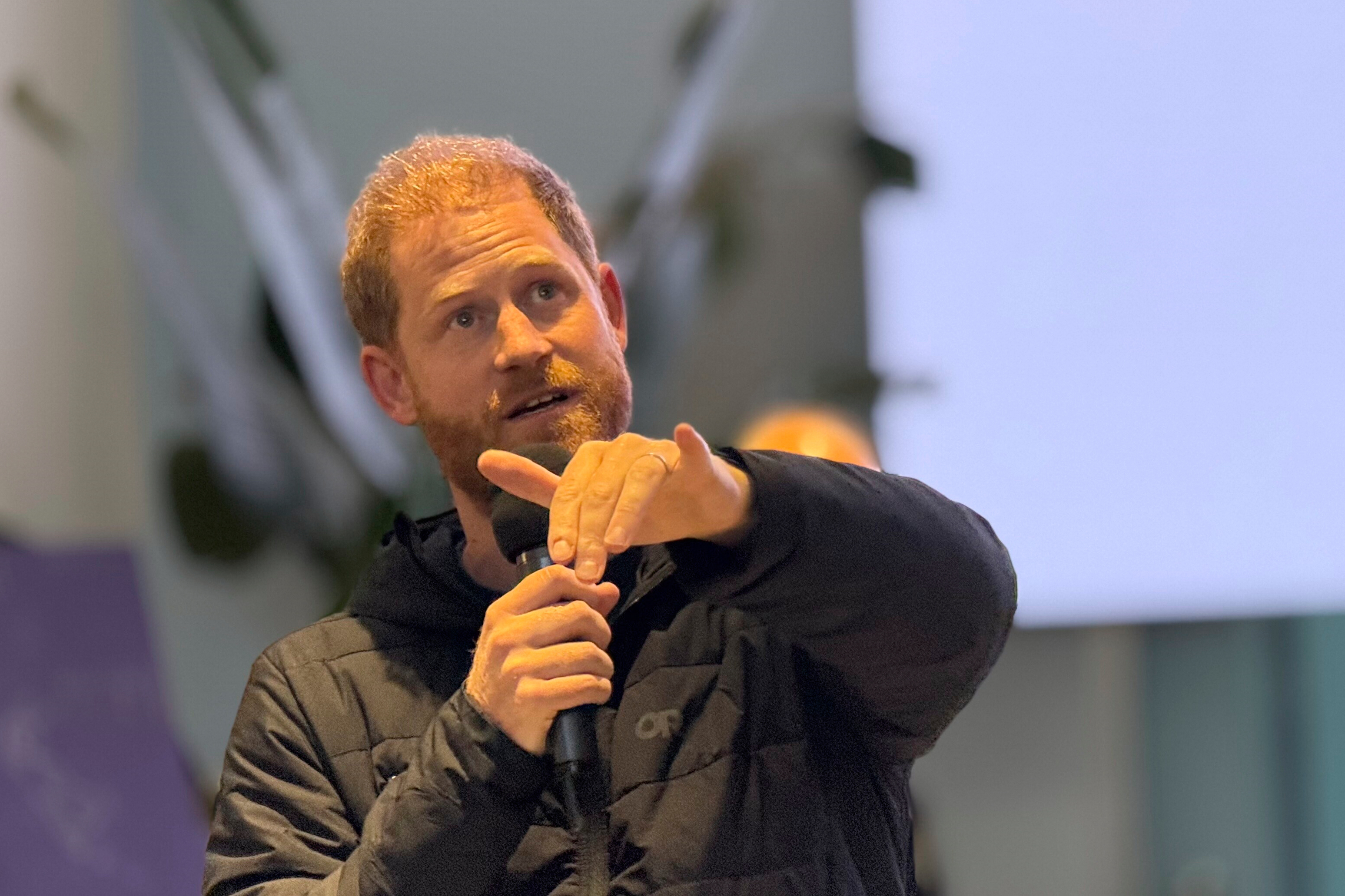 Britain's Prince Harry speaks to Ukrainian war veterans during his visit to Superhumans rehabilitation center near Lviv, Ukraine, April 10, 2025. (AP Photo)