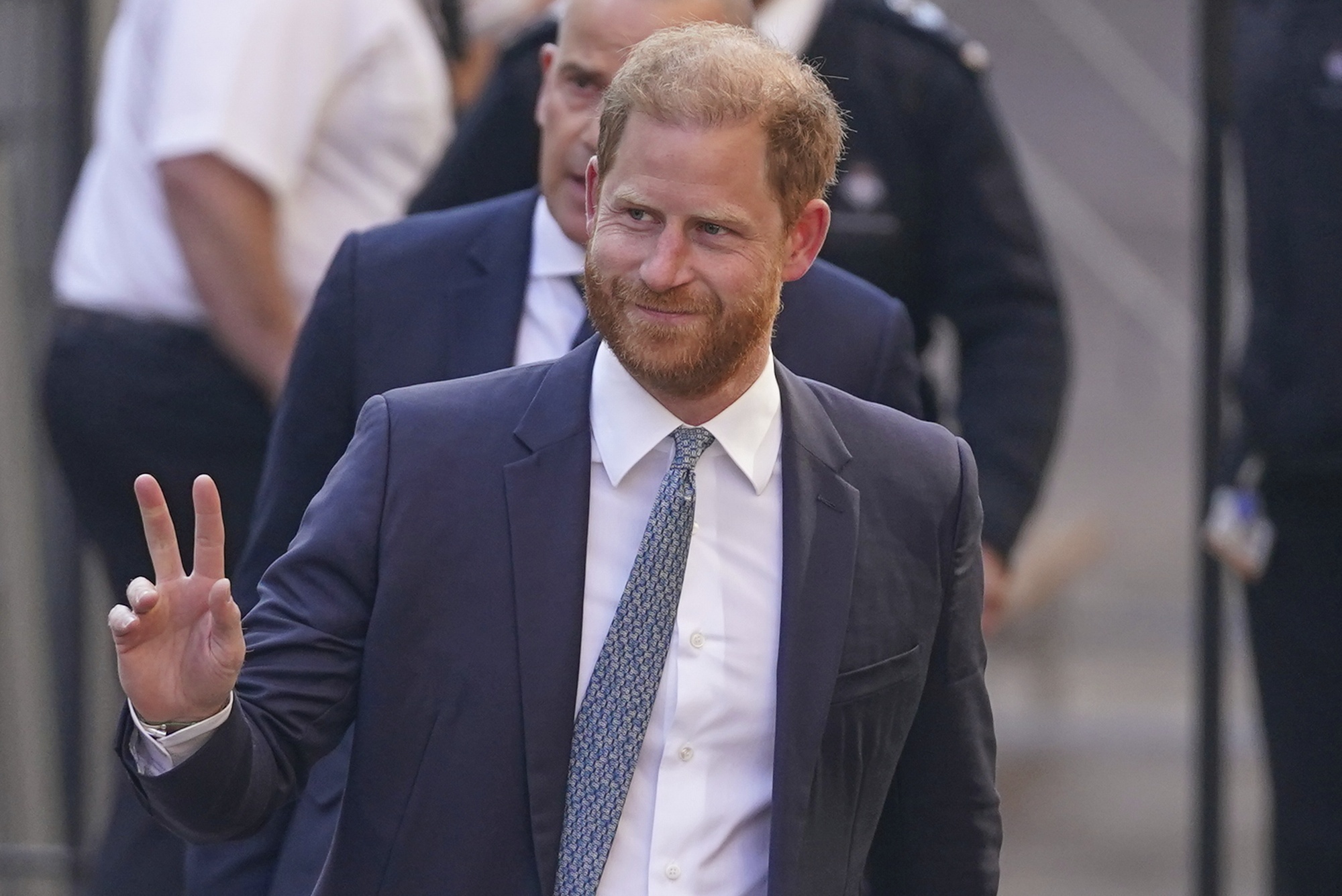 Prince Harry gestures as he arrives at the High Court in London, England, Tuesday, April 8, 2025. (AP Photo/Alberto Pezzali)