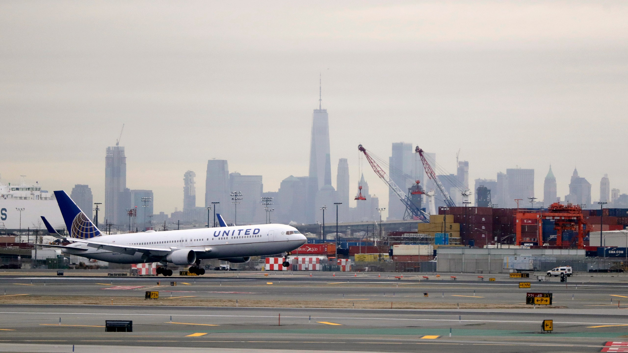 FILE - A United Airlines jet prepares touches down at Newark Liberty International Airport a day after a temporary grounding of aircraft was placed after reports of drones in the flight path, Wednesday, Jan. 23, 2019, in Newark, N.J. (AP Photo/Julio Cortez, File)