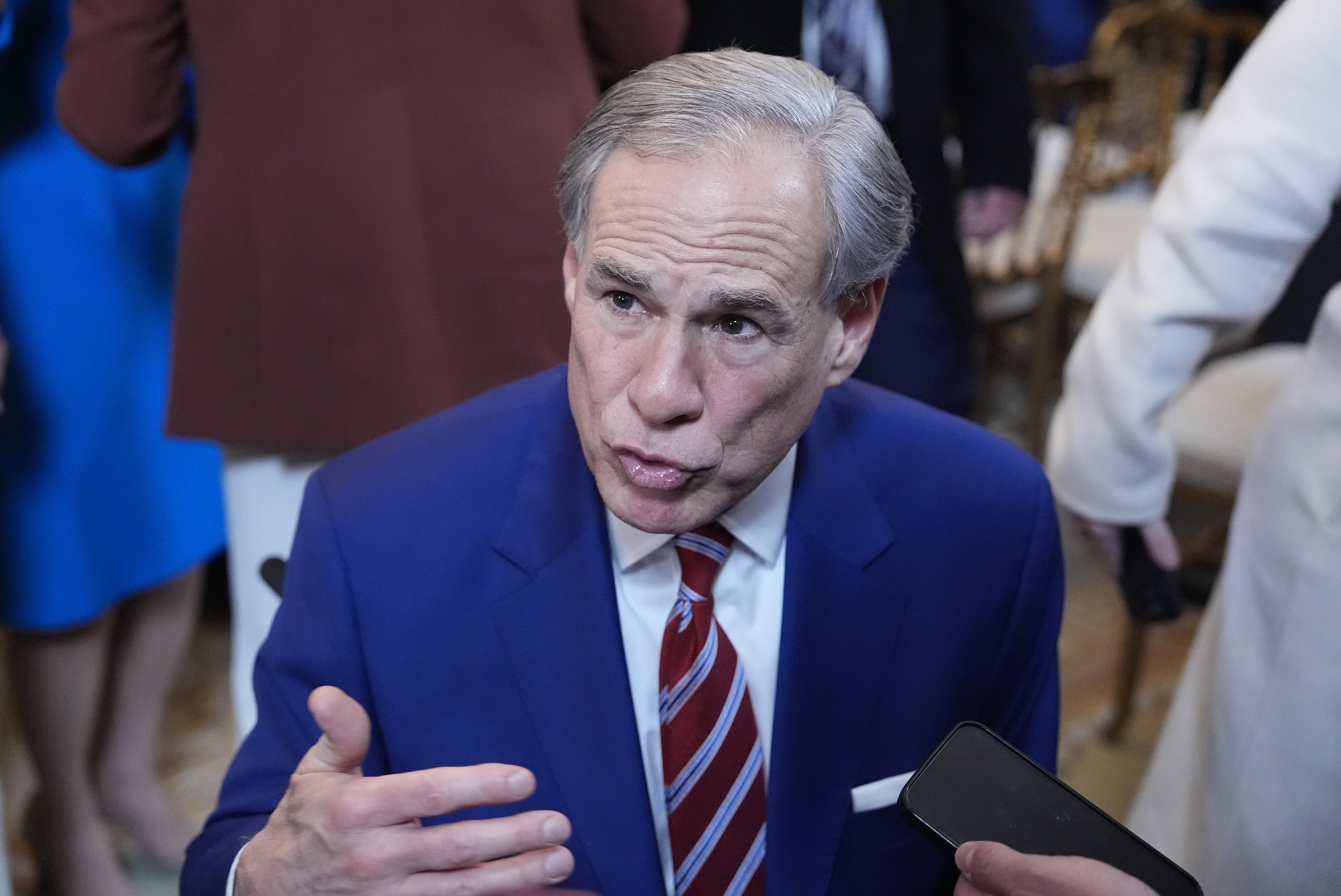 FILE - Texas Gov. Greg Abbott talks in the East Room of the White House, Feb. 5, 2025, in Washington. (AP Photo/Alex Brandon, file)