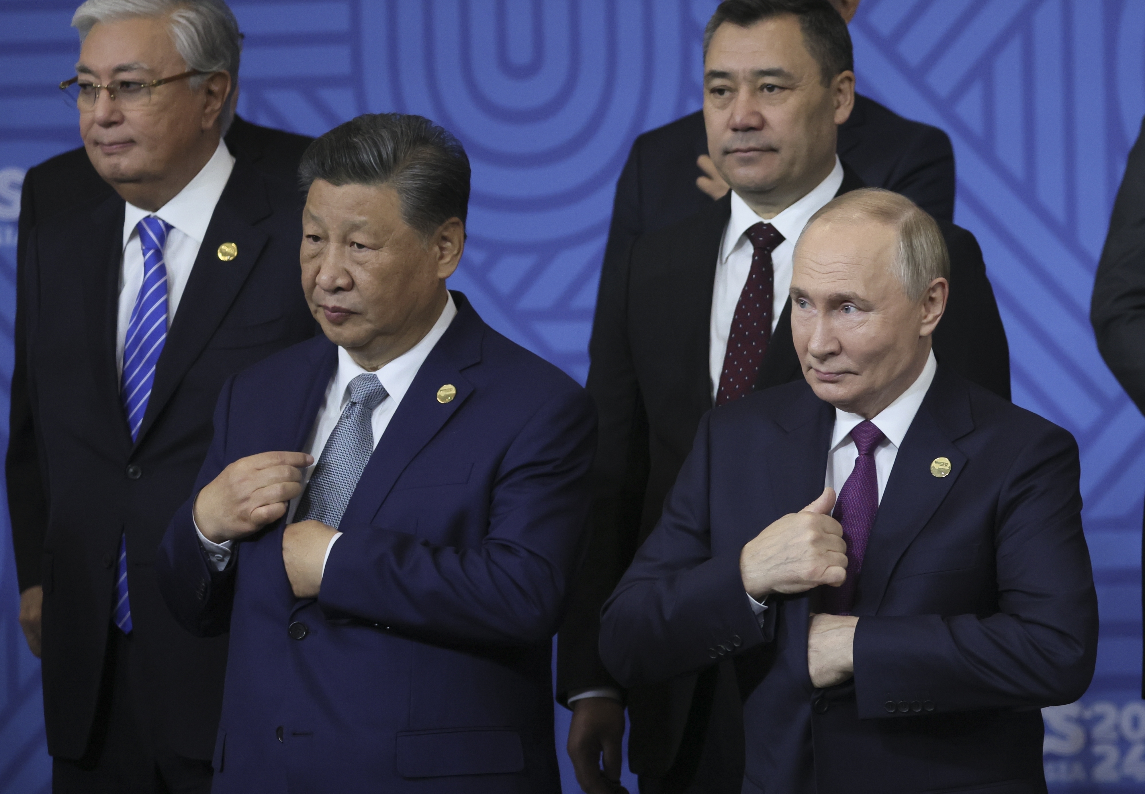 FILE - Chinese President Xi Jinping, left, and Russian President Vladimir Putin attend a group photo ceremony prior to Outreach/BRICS Plus format session at the BRICS Summit in Kazan, Russia, Oct. 24, 2024. (Maxim Shipenkov, Pool Photo via AP, File)