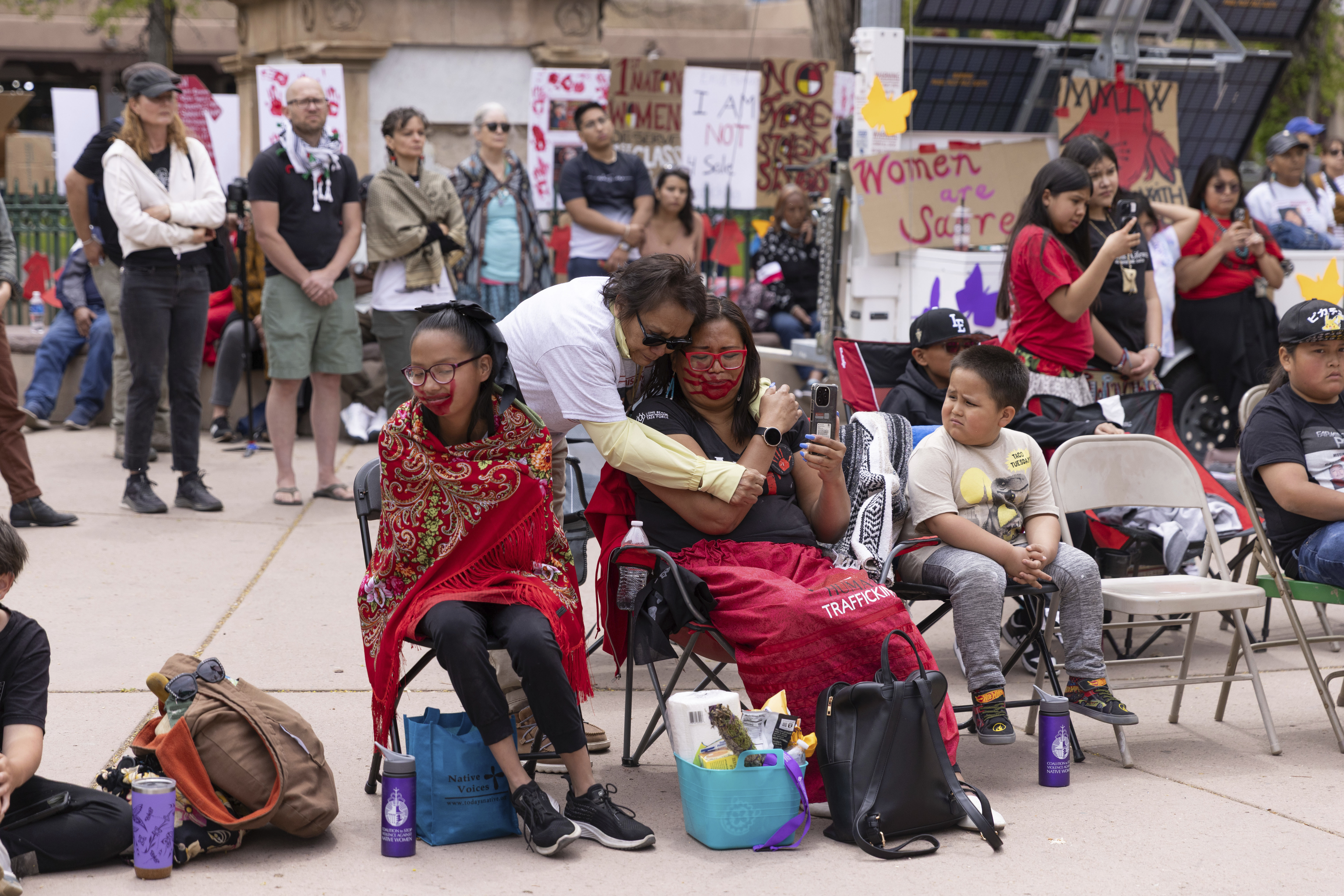 Family members listen to speeches at a Missing Murdered Indigenous People awareness rally in Santa Fe, N.M., Sunday, May 4, 2025. (Nilaya Sabnis via AP)