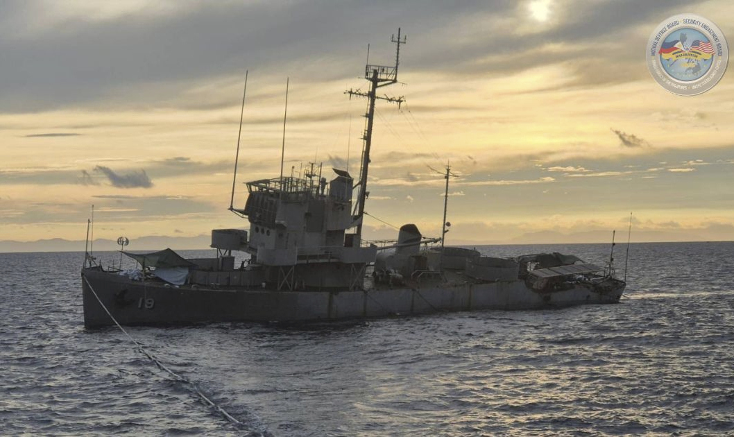 In this handout photo, provided by the Armed Forces of the Philippines Public Affairs Office (PAO), the decommissioned Philippine Navy BRP Miguel Malvar (PS-19) takes on water before sinking while being positioned as vessel target prompting the cancellation of a live-fire drill as part of a joint US-Philippines military exercises called Balikatan or "shoulder to shoulder" approximately 30 nautical miles west of San Antonio, Zambales, Philippines on Monday, May 5, 2025. (Armed Forces of the Philippines PAO via AP)