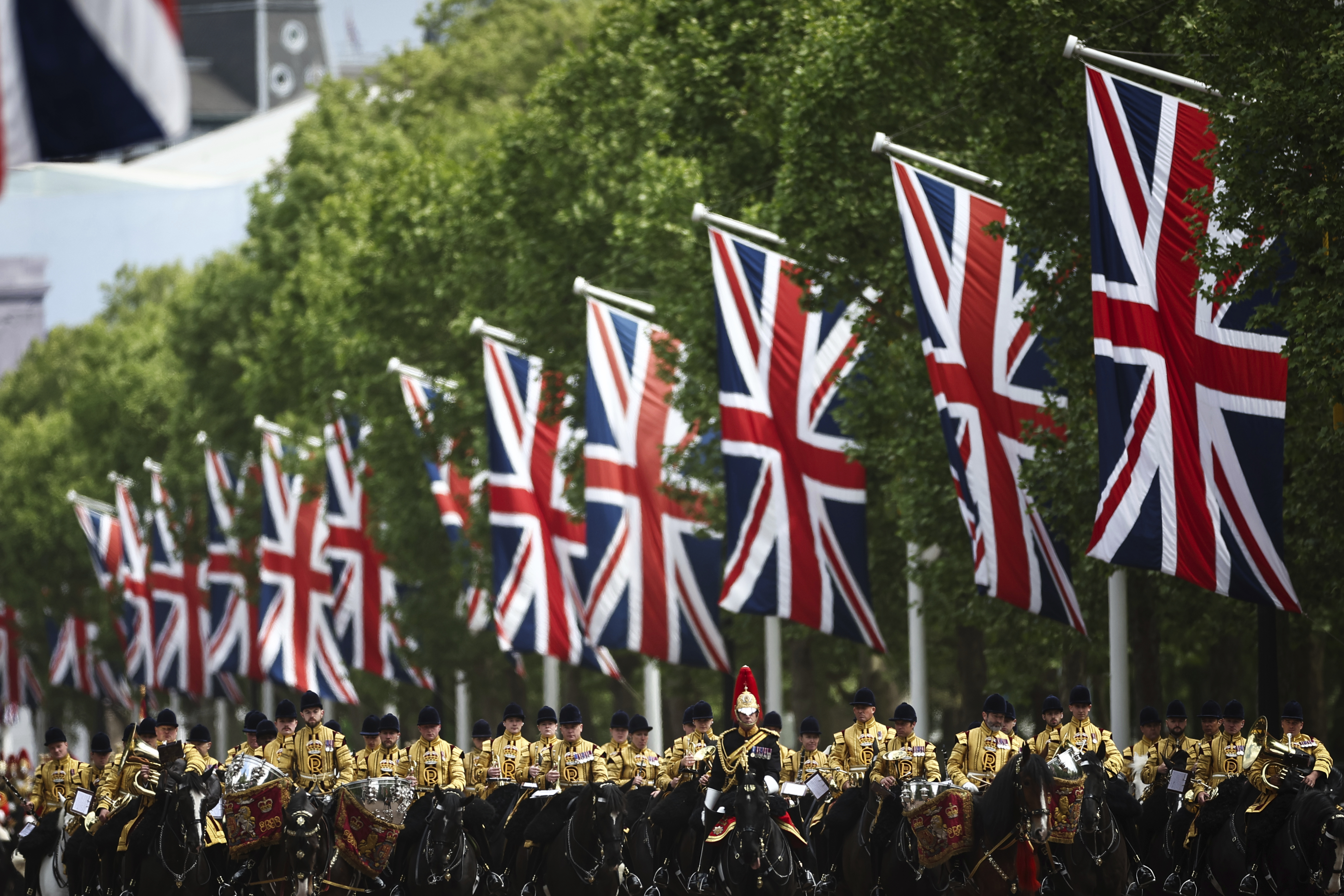 Members of the armed forces parade down The Mall, during the VE Day 80th anniversary parade, in London, Monday, May 5, 2025. (Henry Nicholls/Pool Photo via AP)