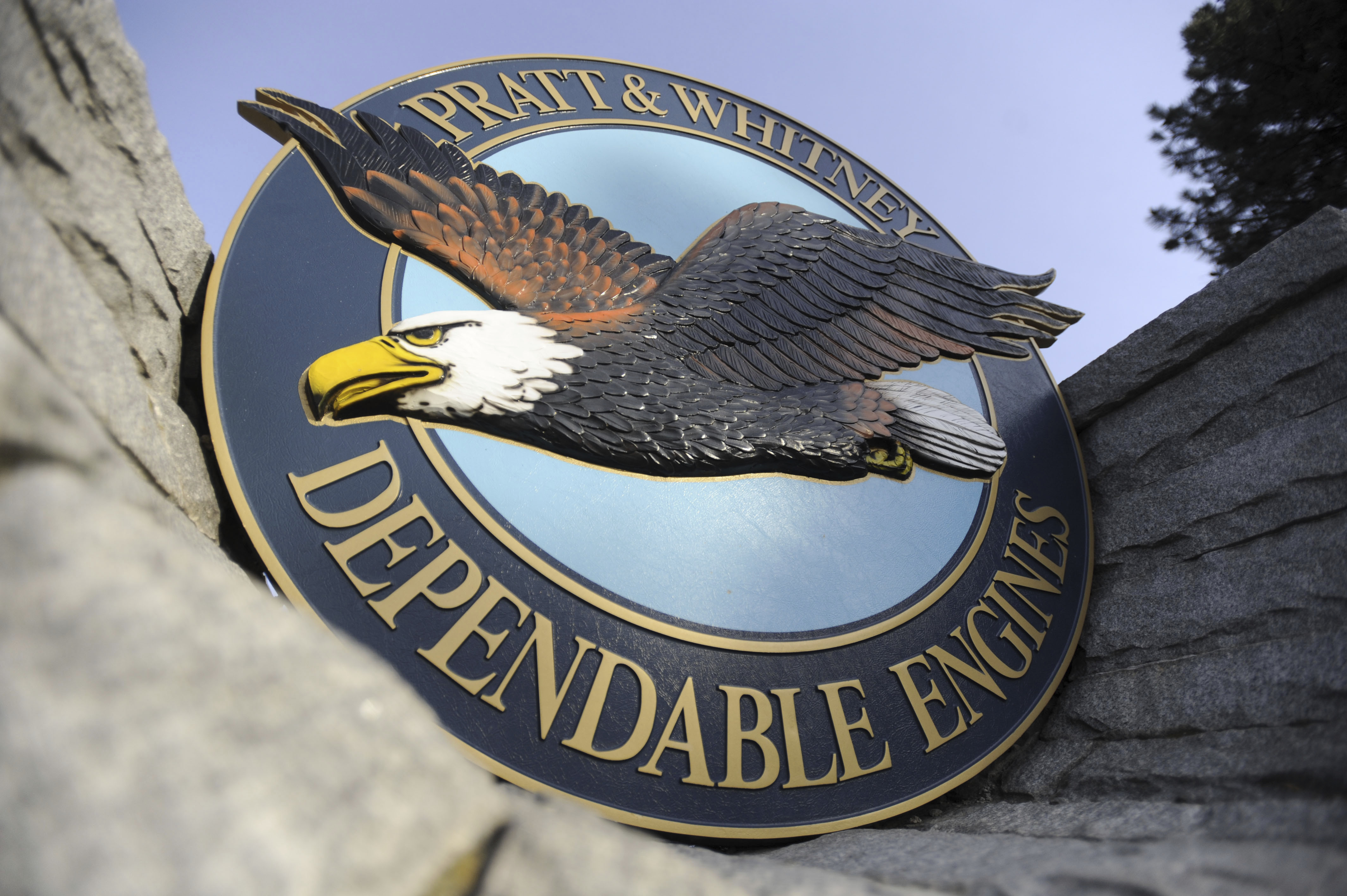 FILE - This file photo taken Feb. 5, 2010, shows a "Pratt & Whitney Dependable Engines" emblem at the plant in East Hartford, Conn. (AP Photo/Jessica Hil, filel)