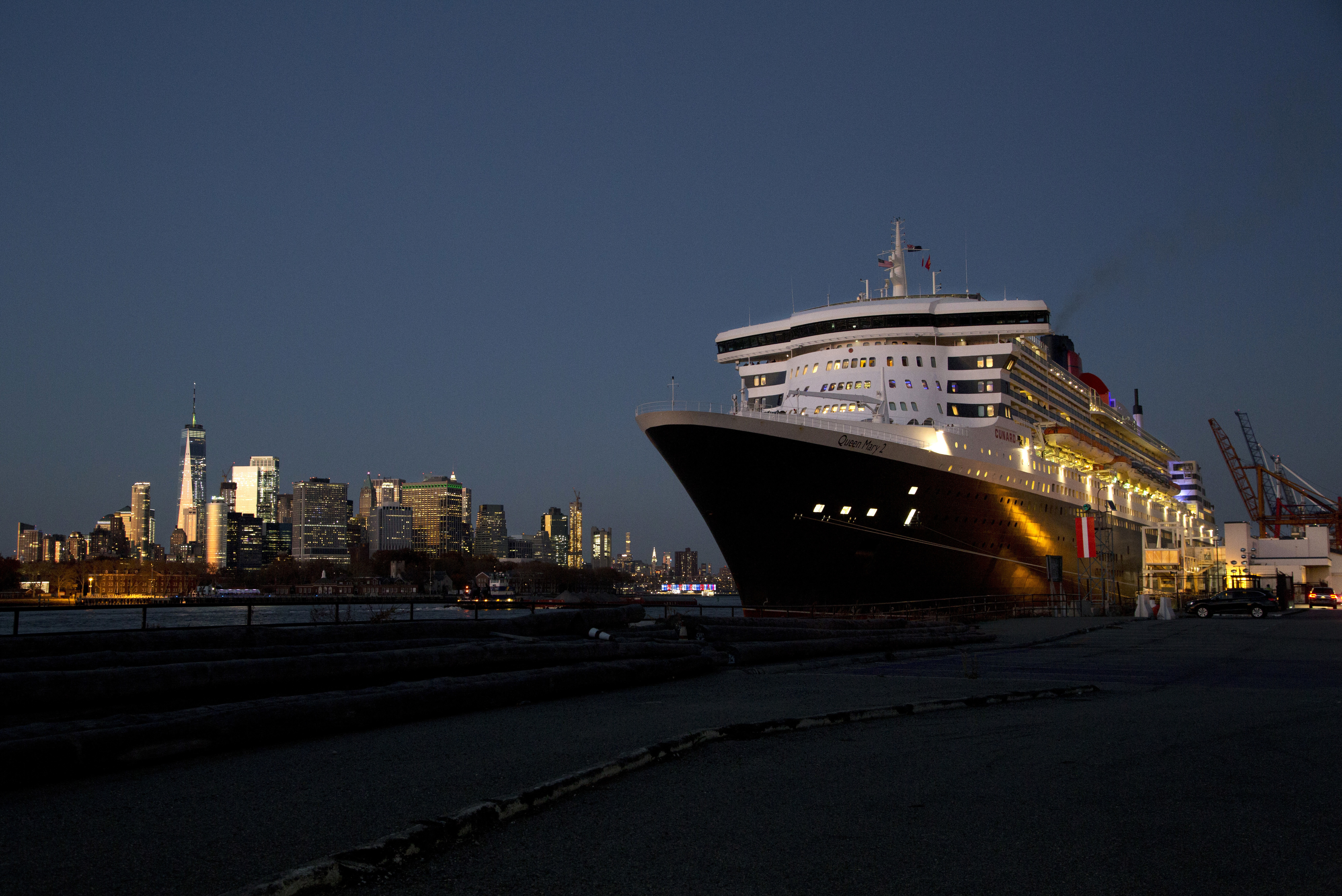 FILE - The Queen Mary 2 prepares to depart the Red Hook Terminal, bound for Southampton, England, in the Brooklyn borough of New York, Nov. 11, 2018. (AP Photo/Mark Lennihan, File)