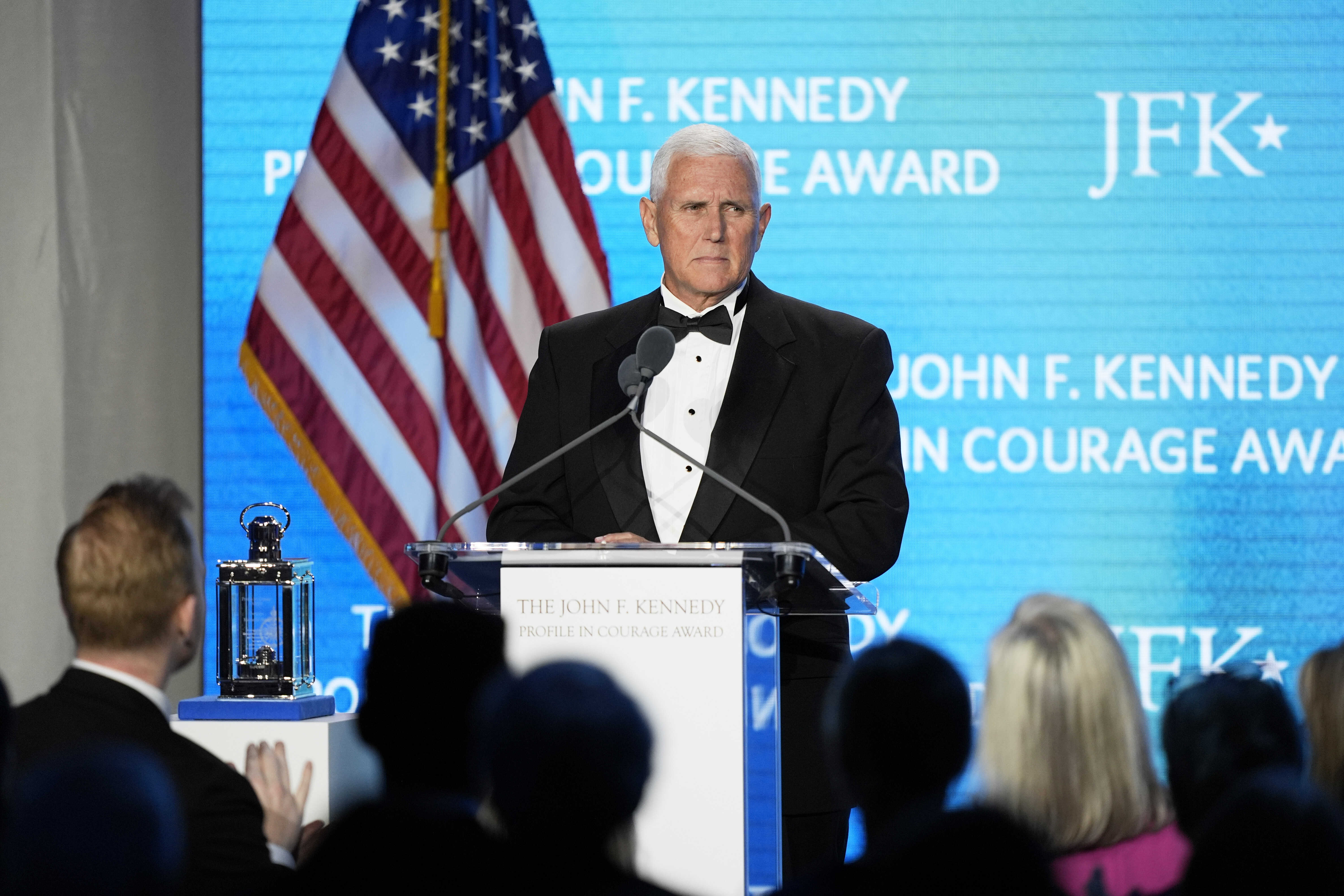 Former Vice President Mike Pence acknowledges a standing ovation as he speaks after receiving the John F. Kennedy Profile in Courage Award during a ceremony at the JFK Library, Sunday, May 4, 2025, in Boston. (AP Photo/Robert F. Bukaty)